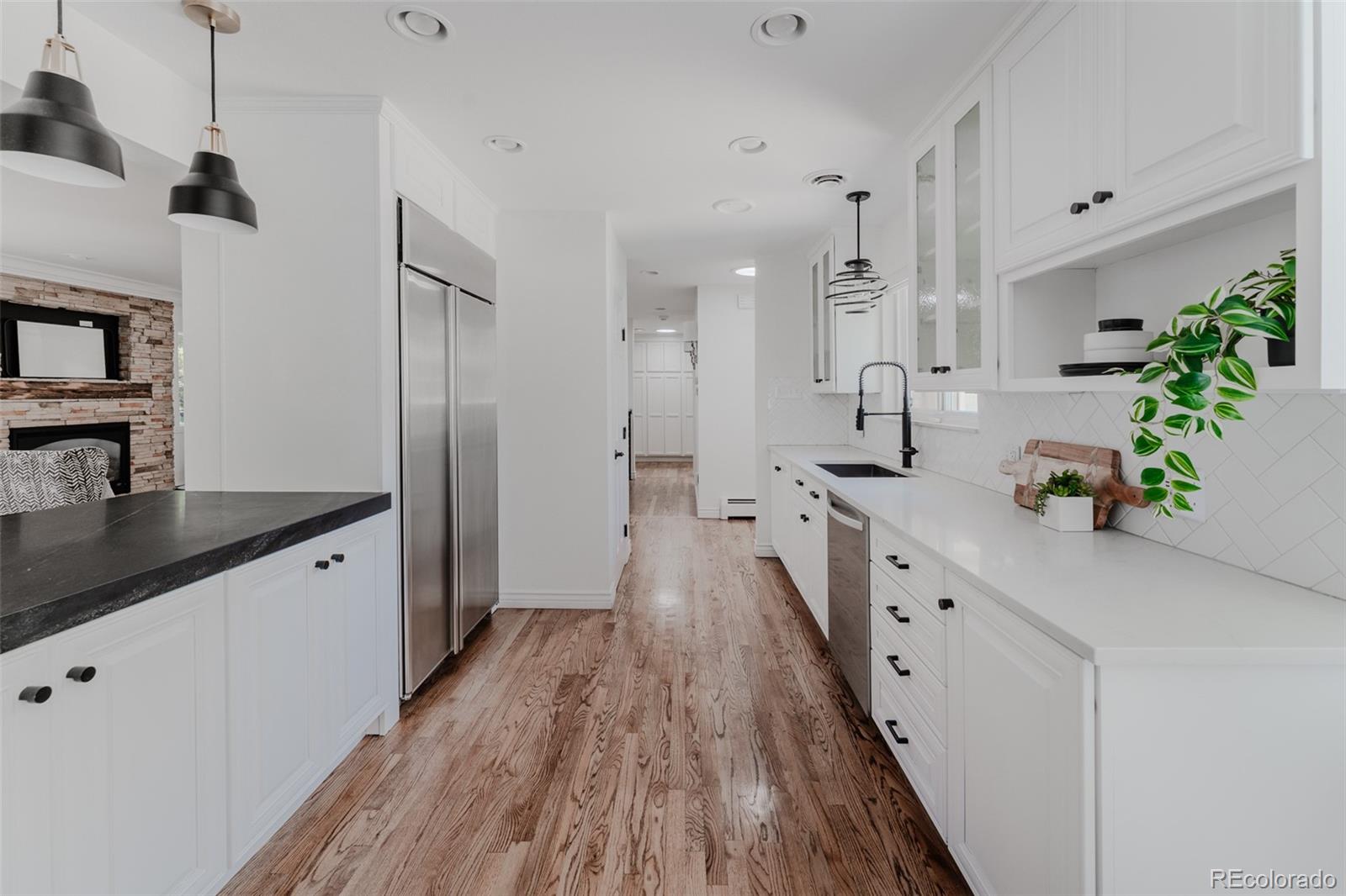 An abundance of cabinets and counter space provides ample storage and ample room for meal preparation.