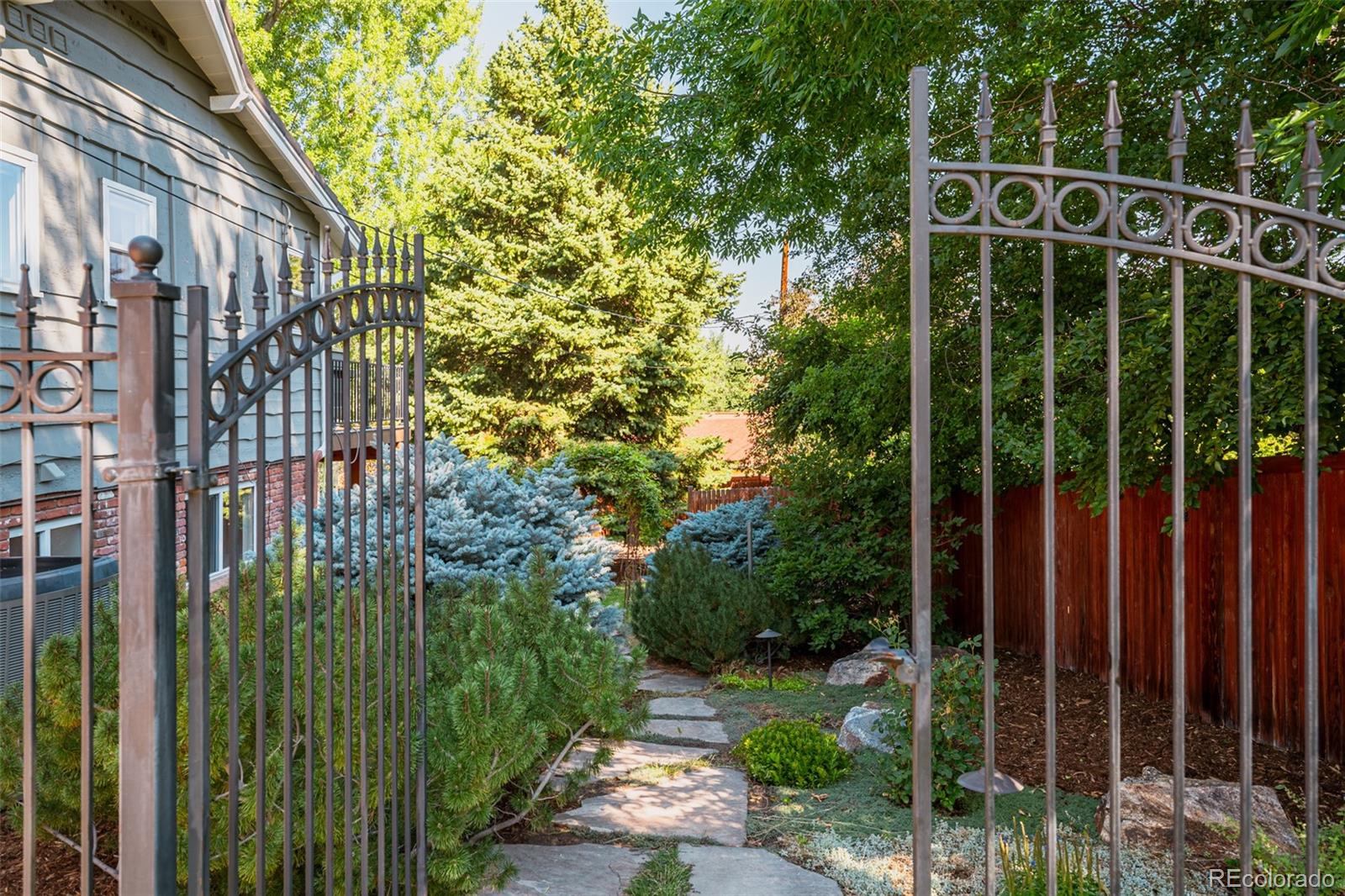 Enter your iron gate to your park like paradise.