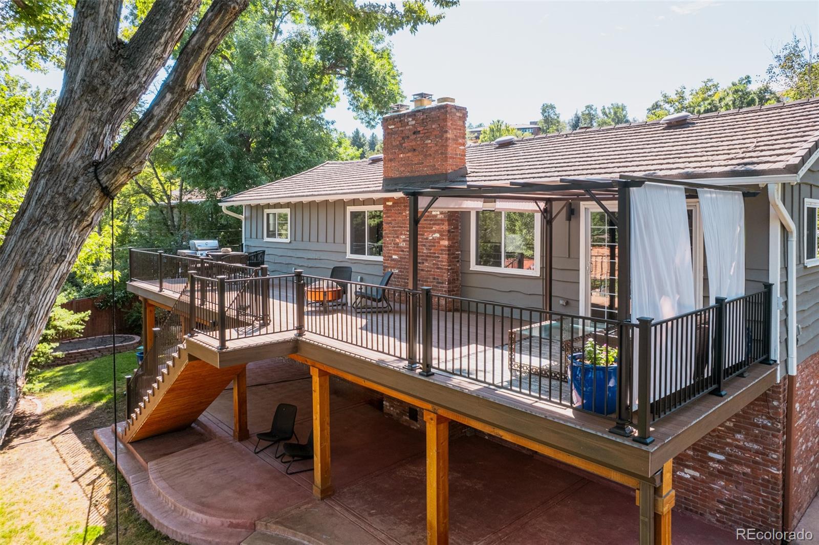 The expansive deck is perfect for BBQs and entertaining, offering a generous space where friends and family can gather to enjoy outdoor dining and leisure. With ample room for seating and activities, this deck becomes the ideal setting for creating lasting memories.