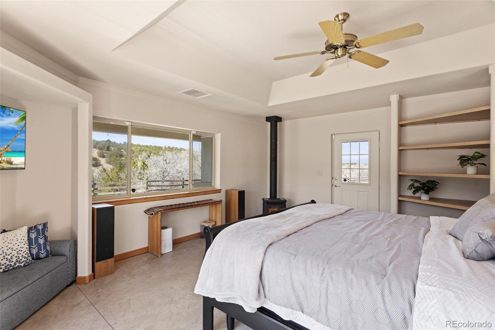 Primary bedroom with walk out to 2nd patio