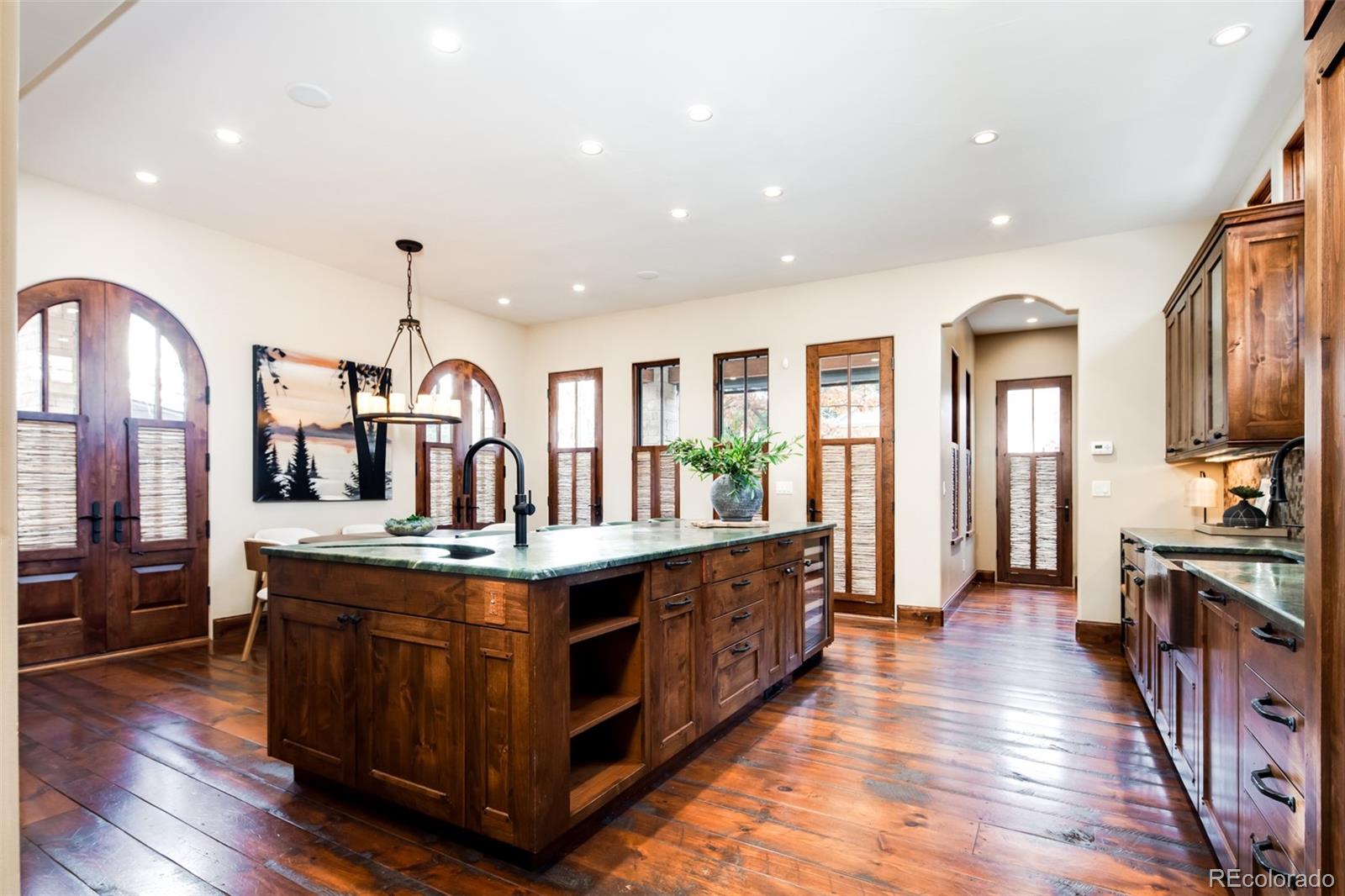 Kitchen with Ample Space and Knotty Alder Cabinetry