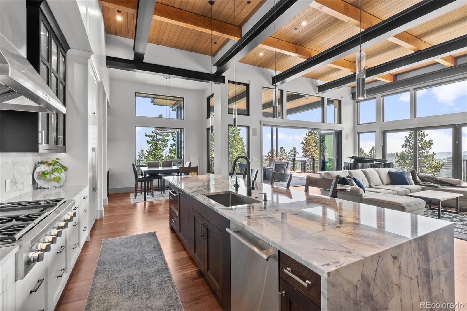 This culinary haven seamlessly connects to the dining area, great room and outdoor living areas, perfect for entertaining