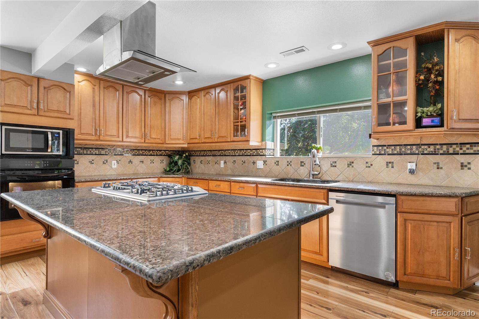 Kitchen has new Gas Cooktop, cabinets have pull out shelves!! Tons of prep space!!