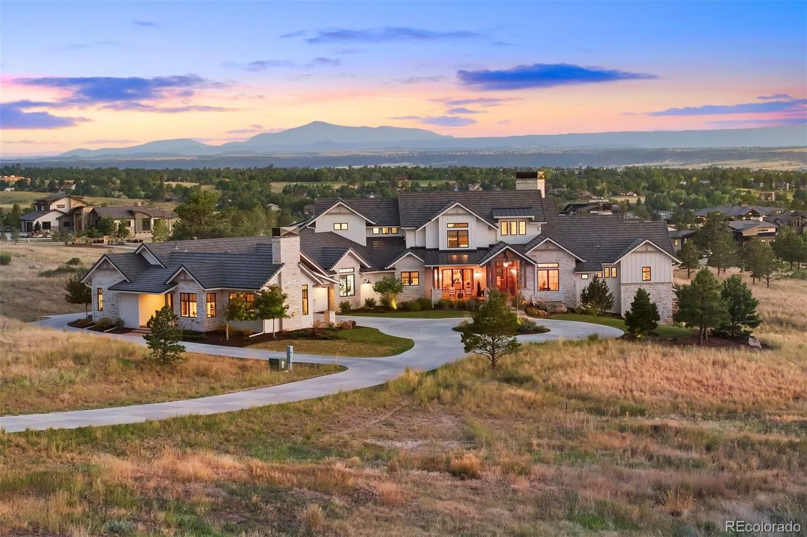 Architecturally exquisite, custom home on over four acres in Colorado Golf Club.