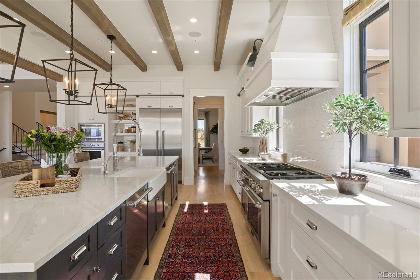 Kitchen leading to butler's and walk-in pantry and formal dining room.