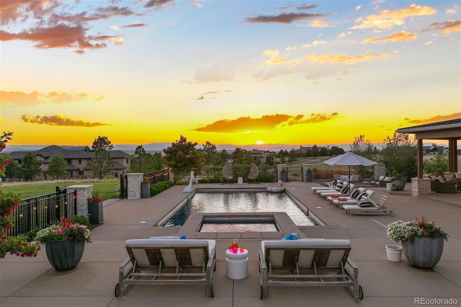 Heated saltwater pool and spa overlook mountain and Pikes Peak views.