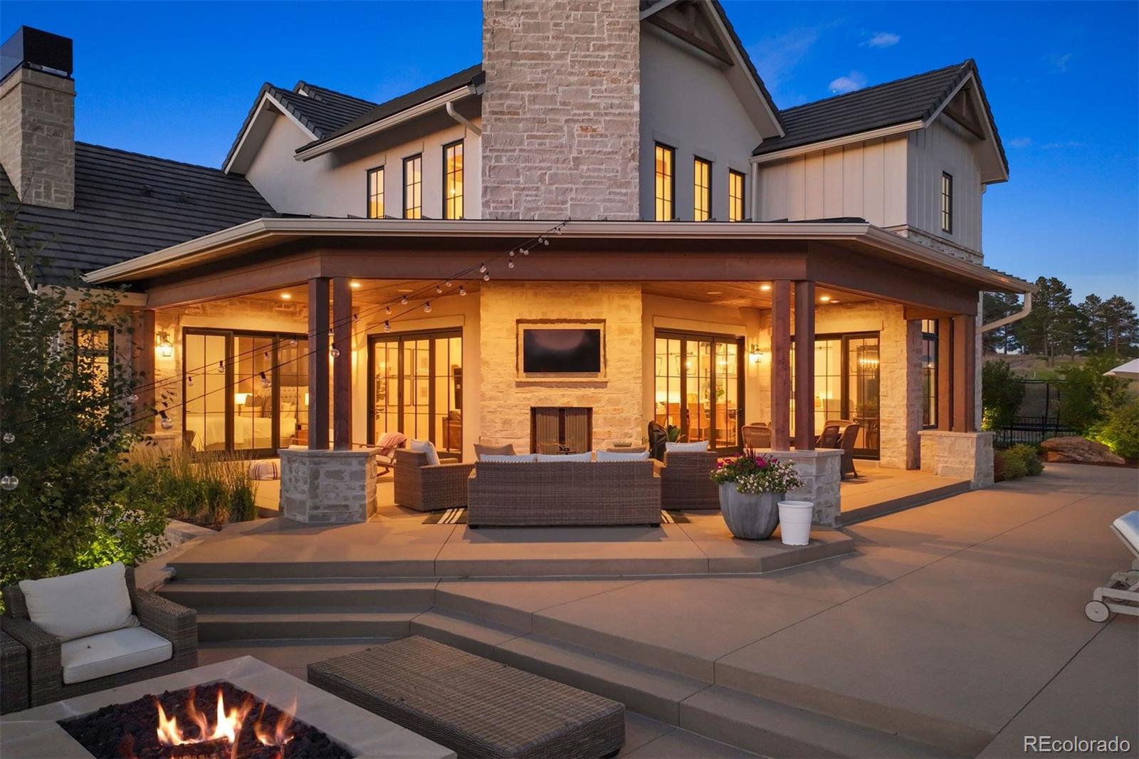 Wrap around covered patio with fireplace.