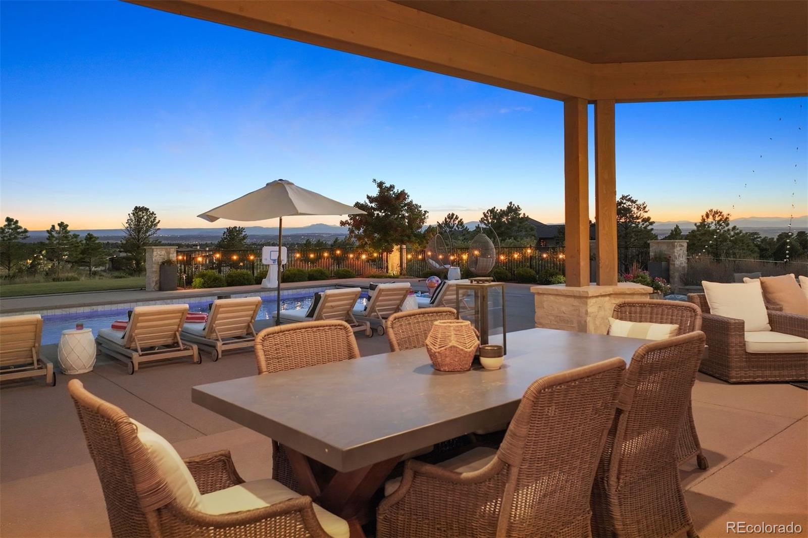 Covered patio overlooking mountain views.