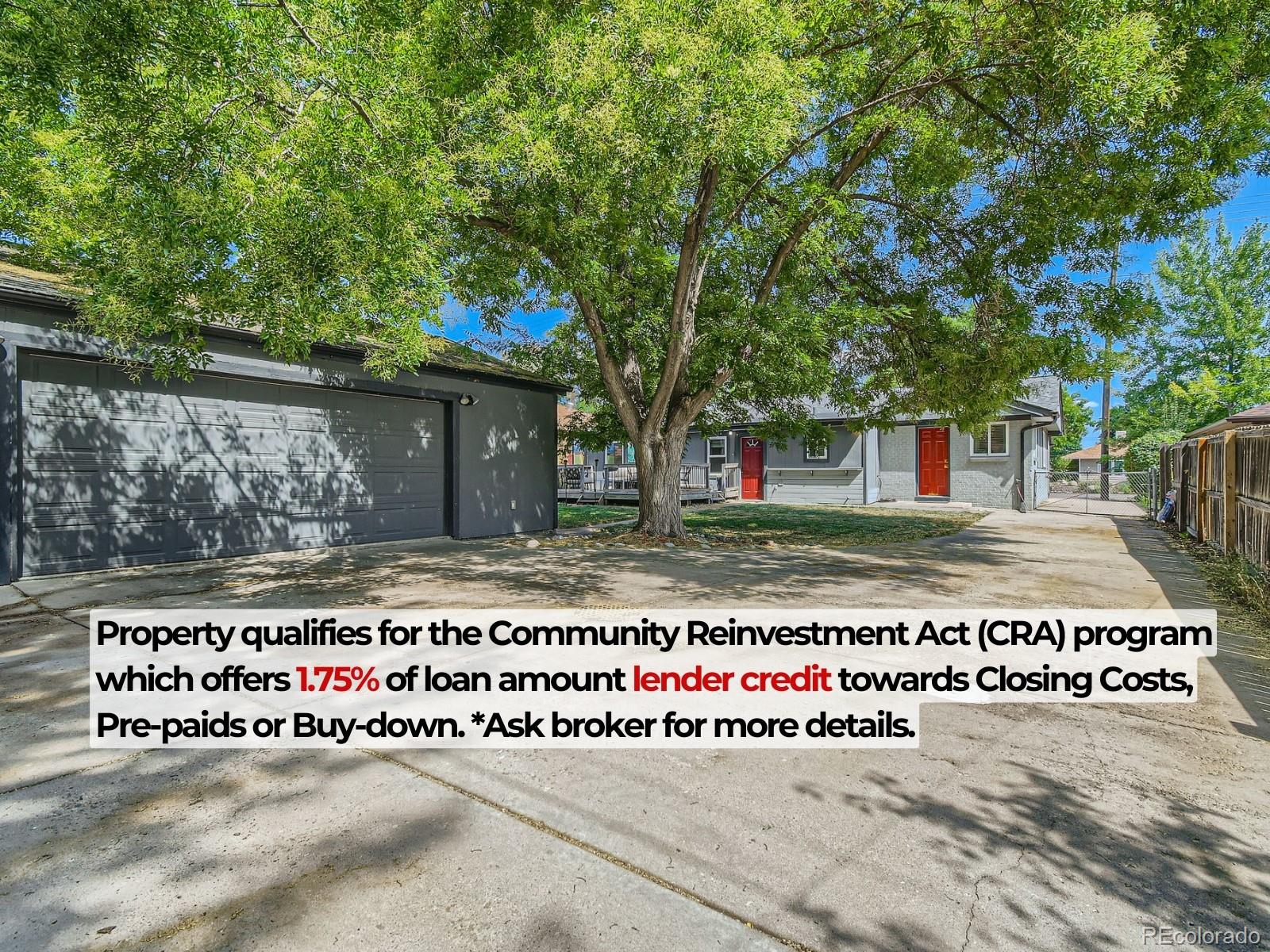 Fenced backyard with a huge driveway & oversized 2 car garage w/ workspace