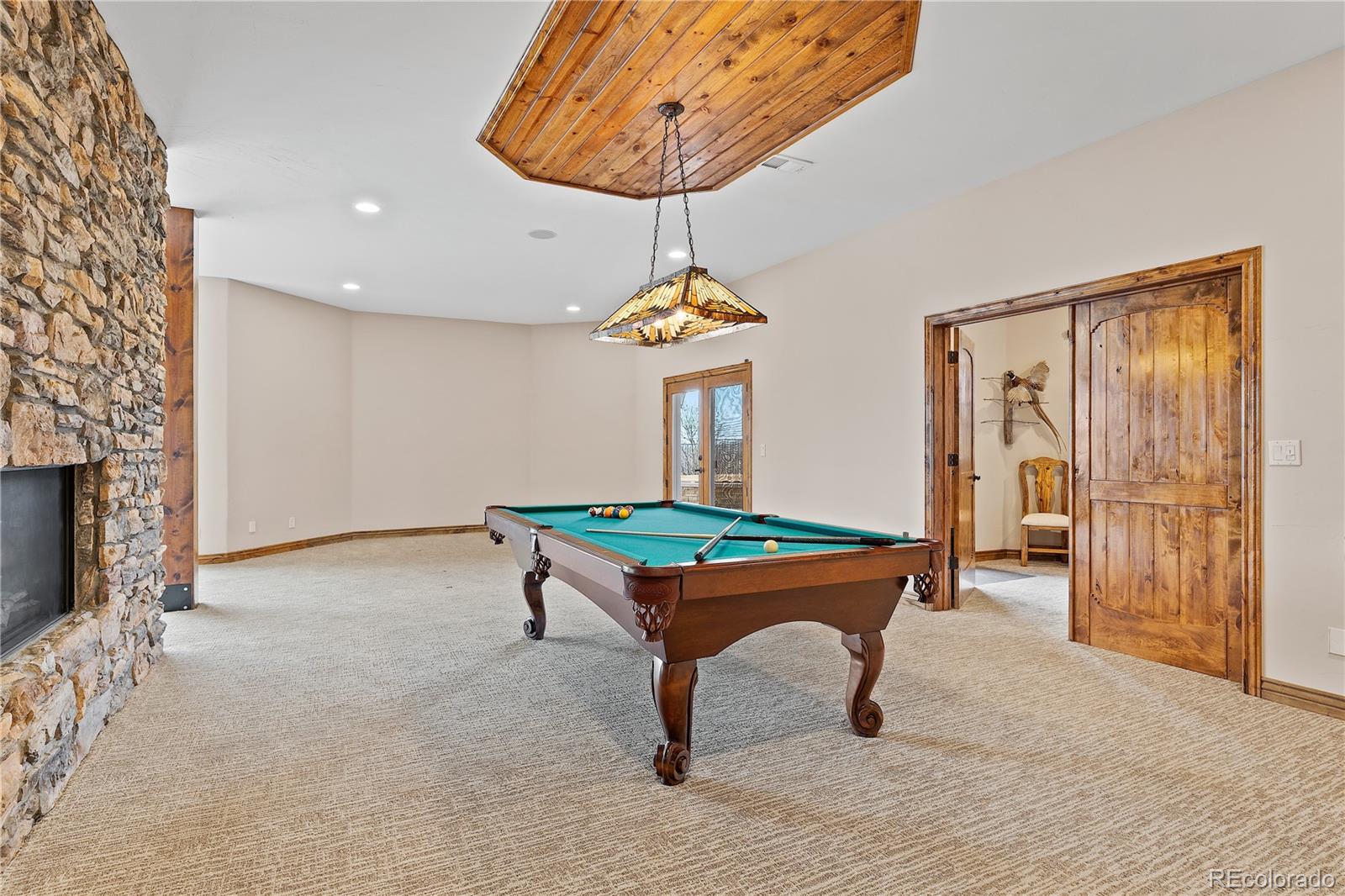 Spacious game area fitting a pool table and ping pong table if desired