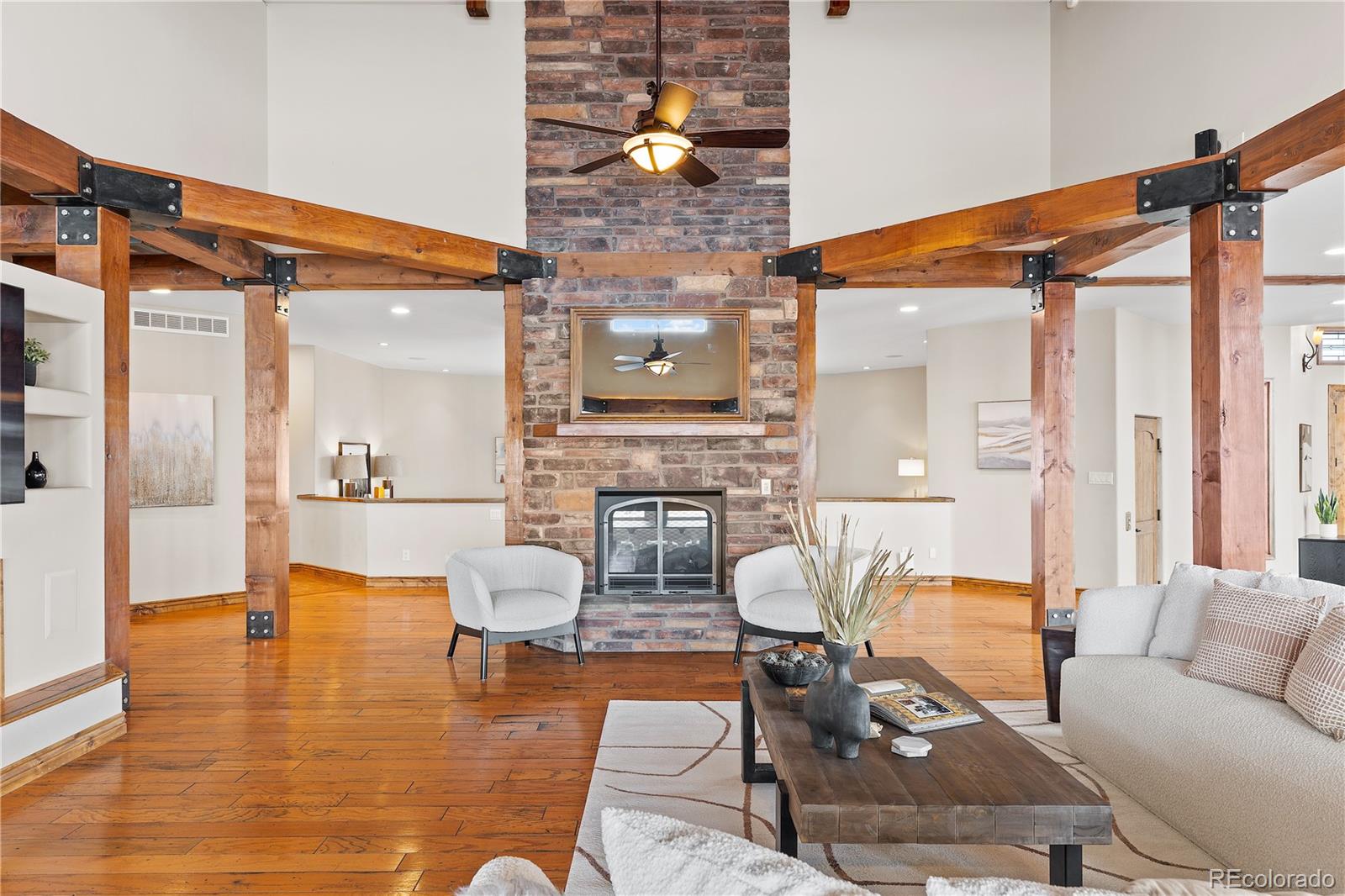 Fireplace separates living area and dining area