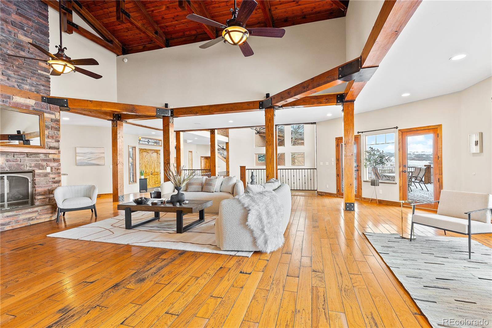 Open floor plan with walkout surrounding deck overlooking the mountains.