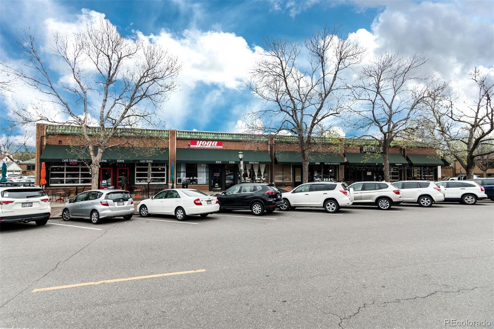 Cake Crumbs, Neighbors Wine Bar, hair salon and Oblio's pizzeria.