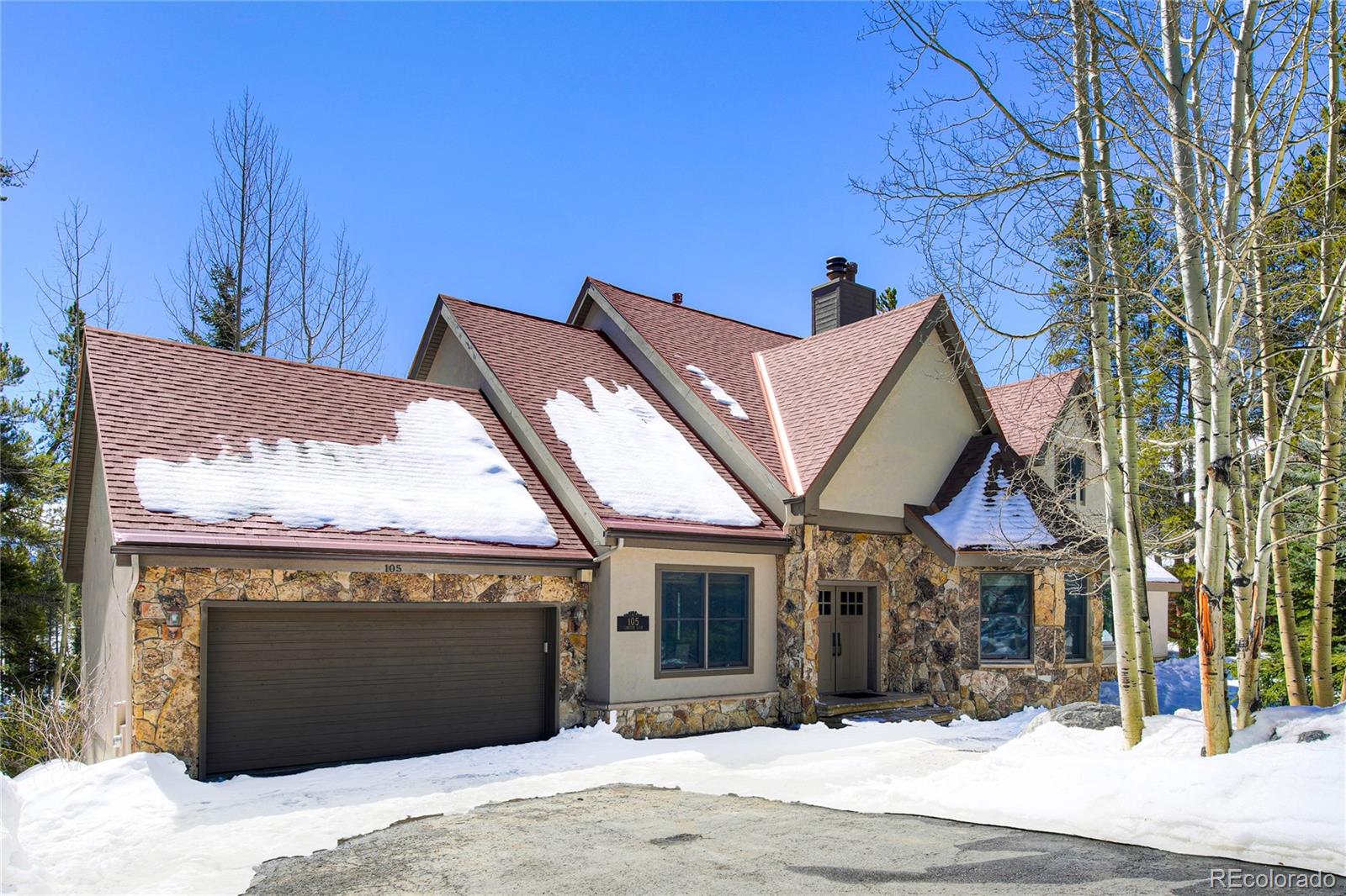 2 car garage, beautiful stone work accents the front entrance (new roof 2018)