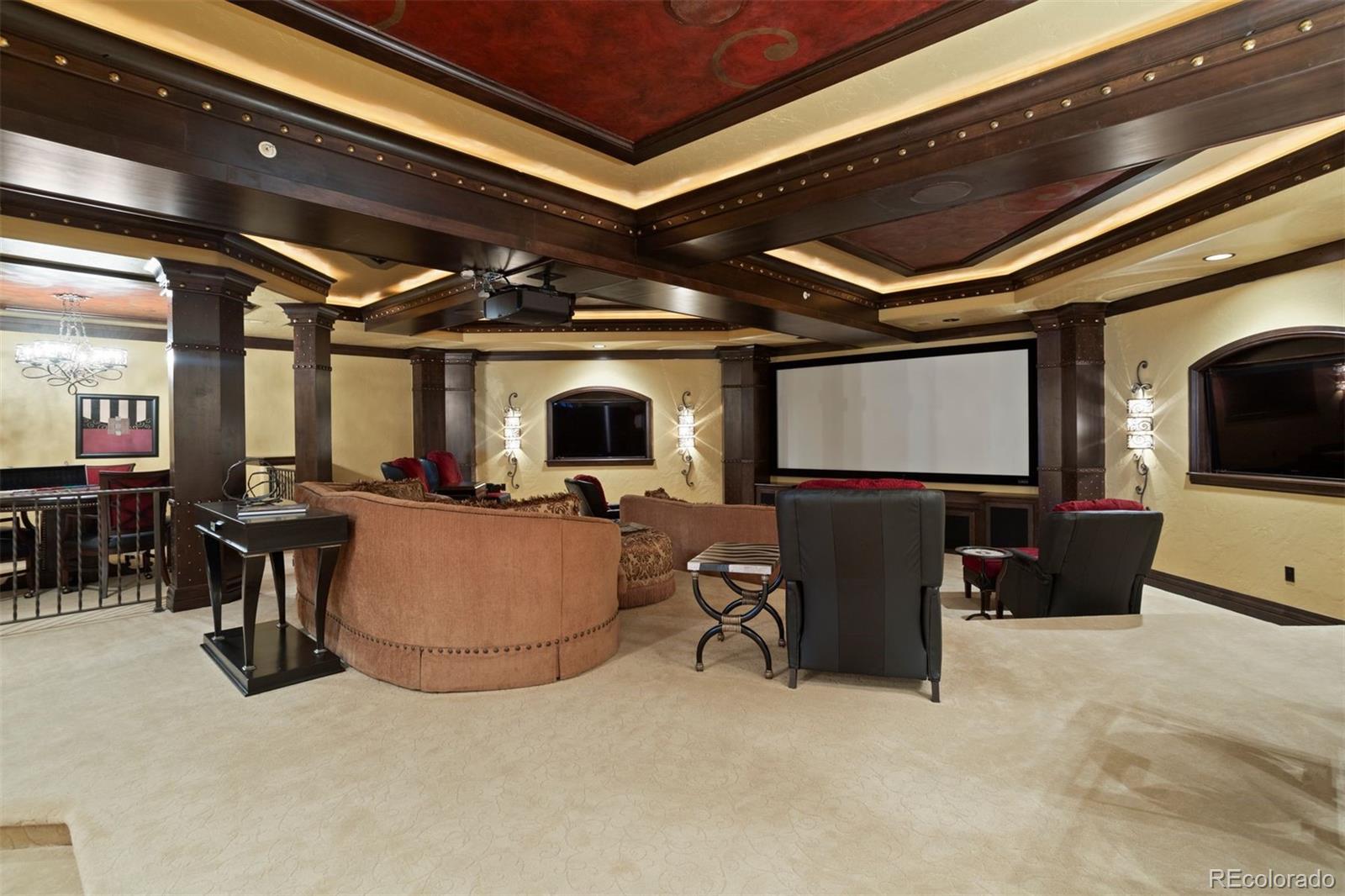 Enjoy the personal theater with multiple sitting areas and room for a poker table.