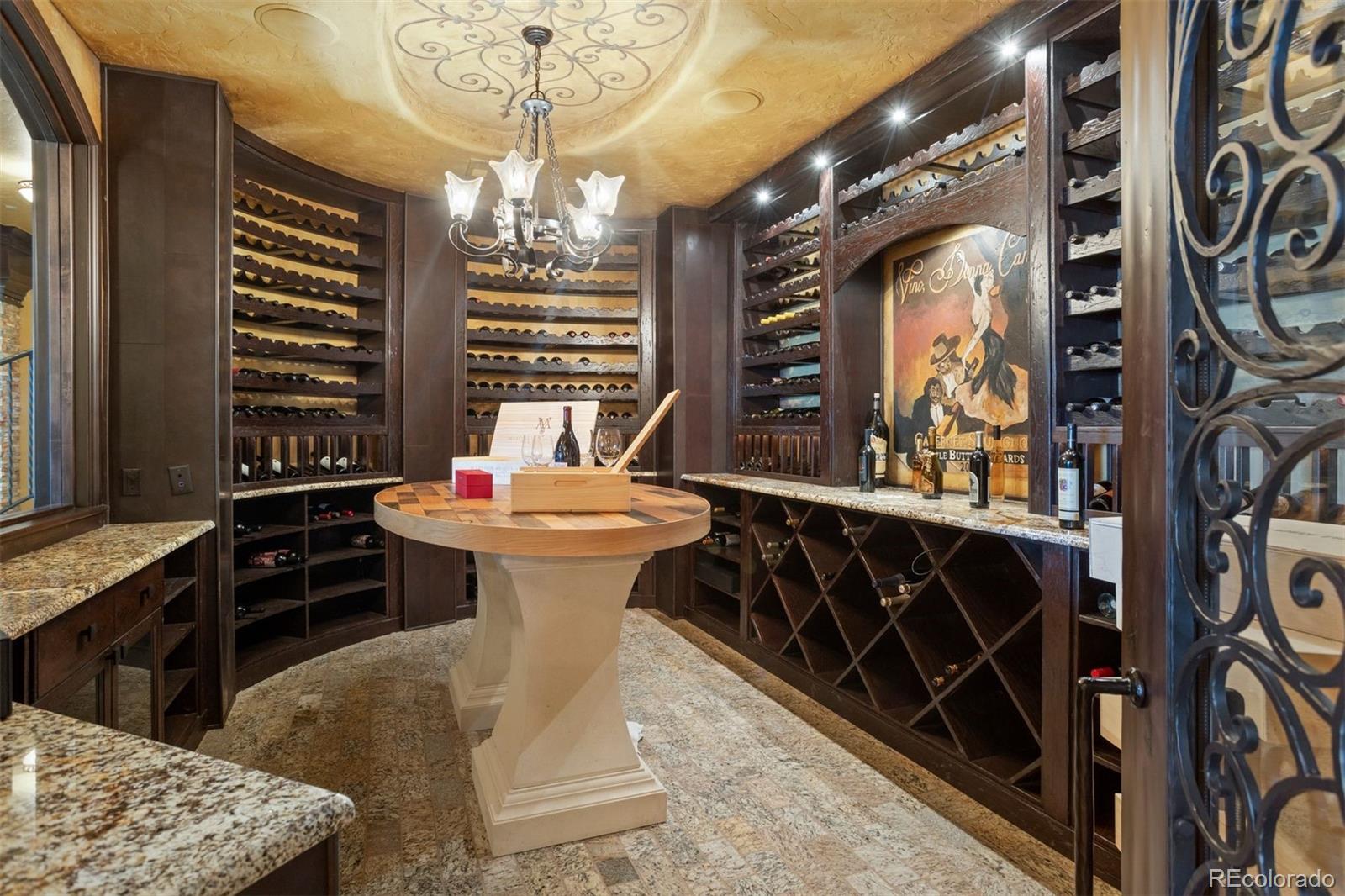 Temperature controlled wine cellar with cigar humidor.