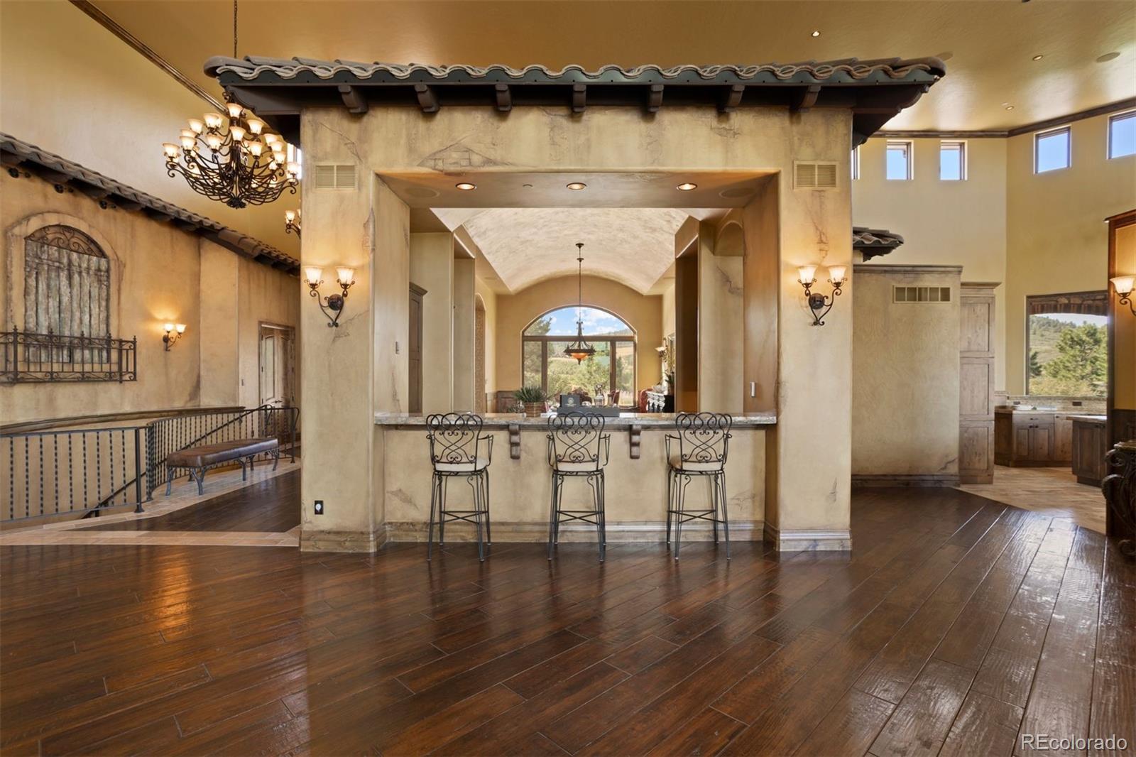 The dining room is spectacular for entertaining with large wet bar and built-in buffet counters.