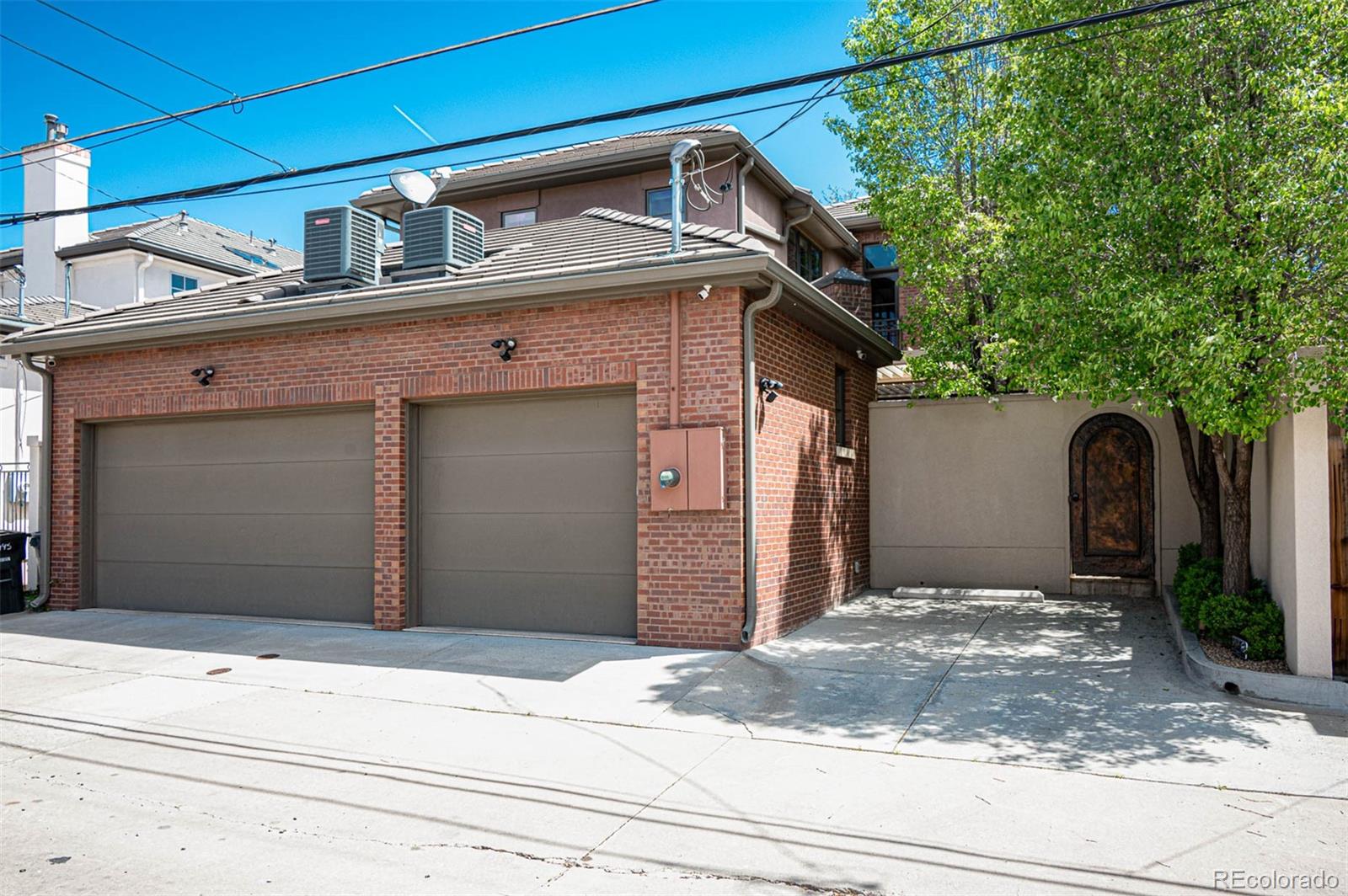 3 car garage with additional 4th off street parking space