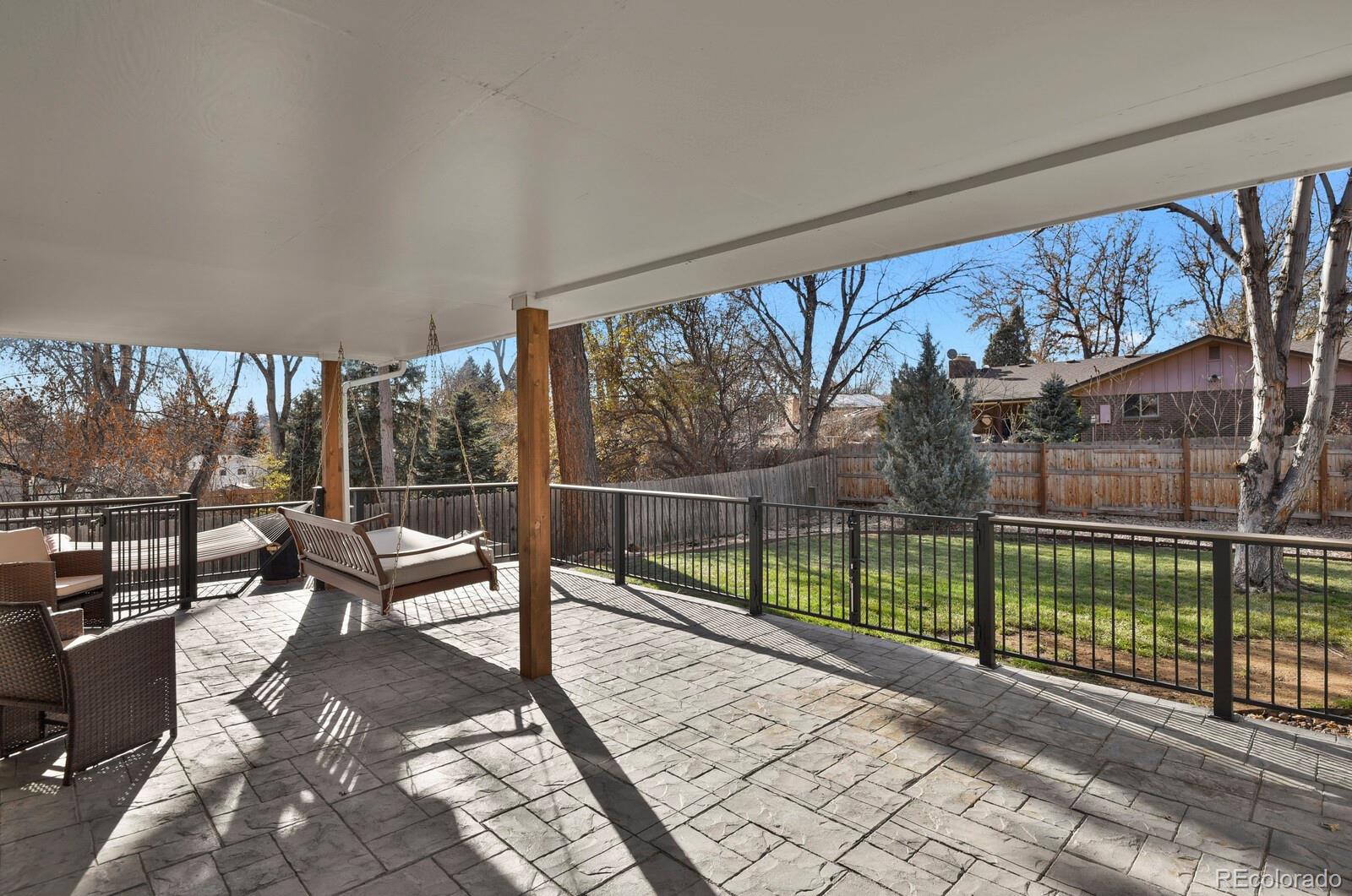 Amazing new stone patio deck with partial shade