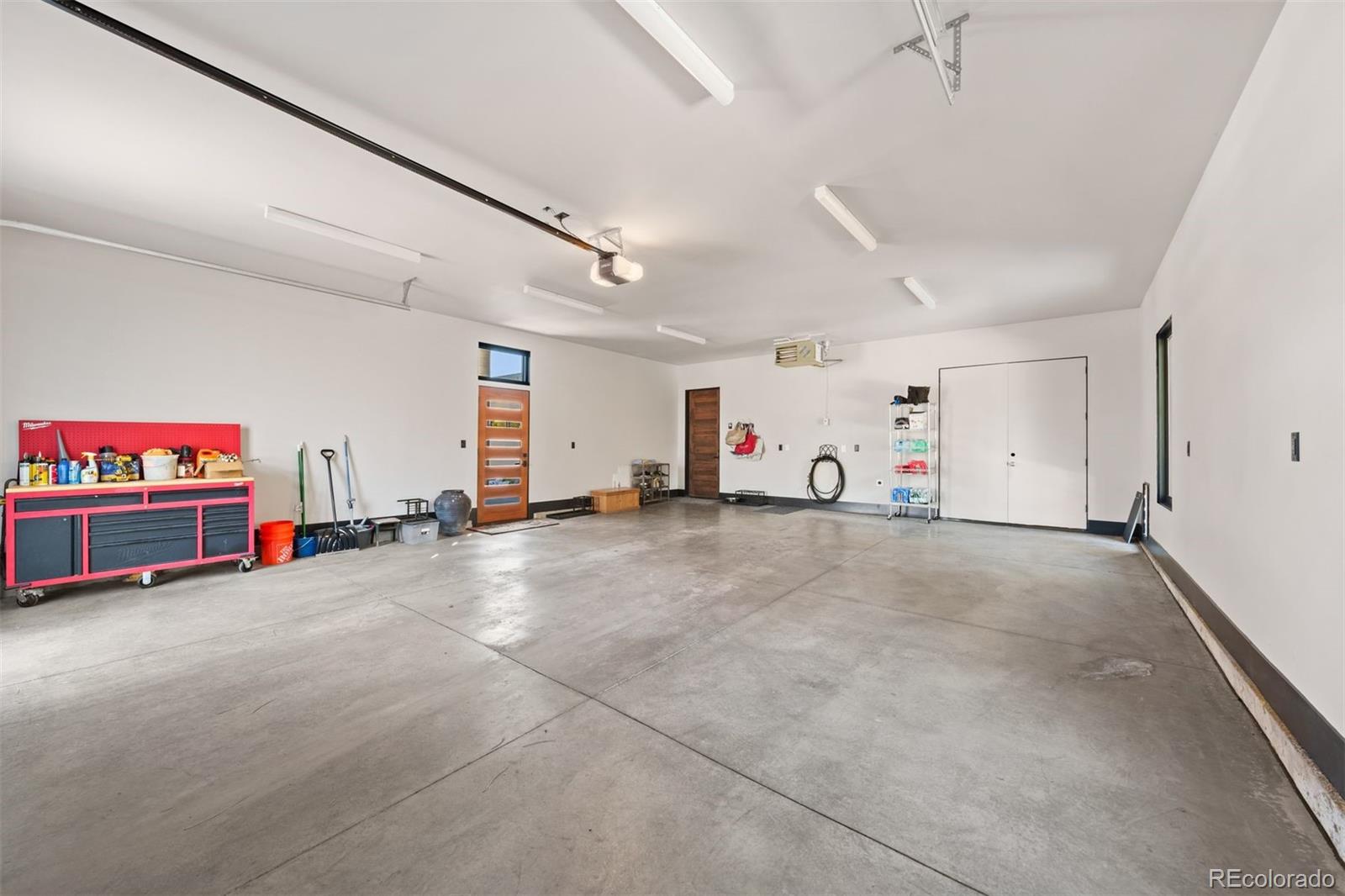 2-car oversized garage with storage closet and exterior access.