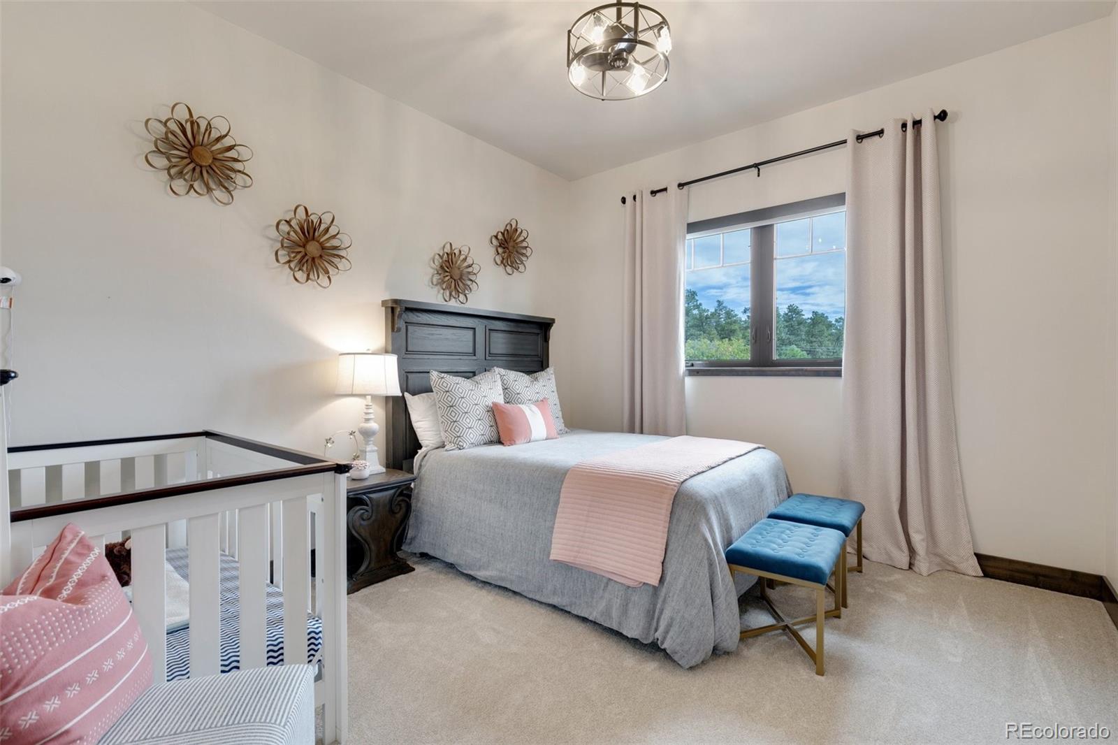 Guest bedroom with powered shades