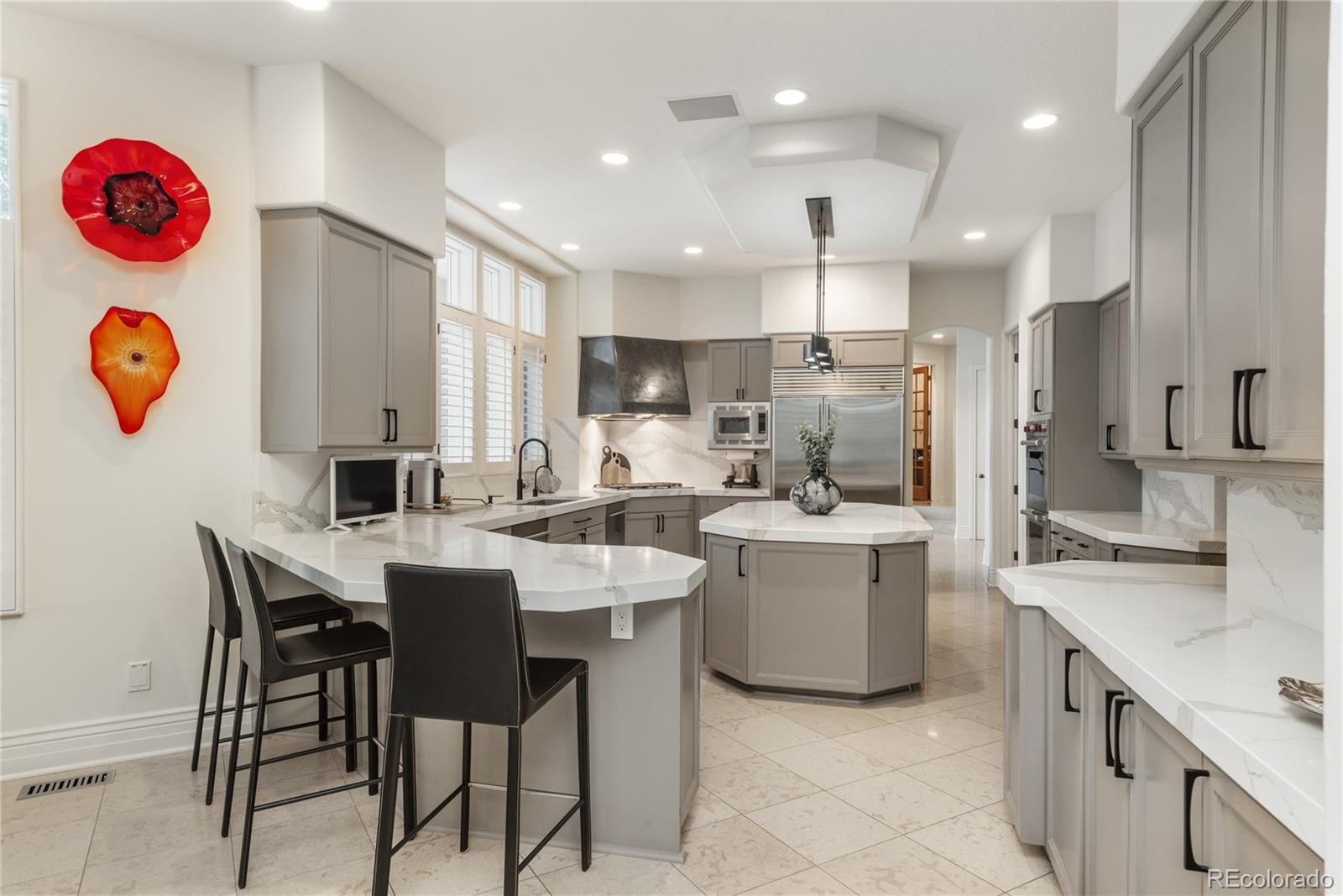 Large open kitchen overlooking pool and grounds