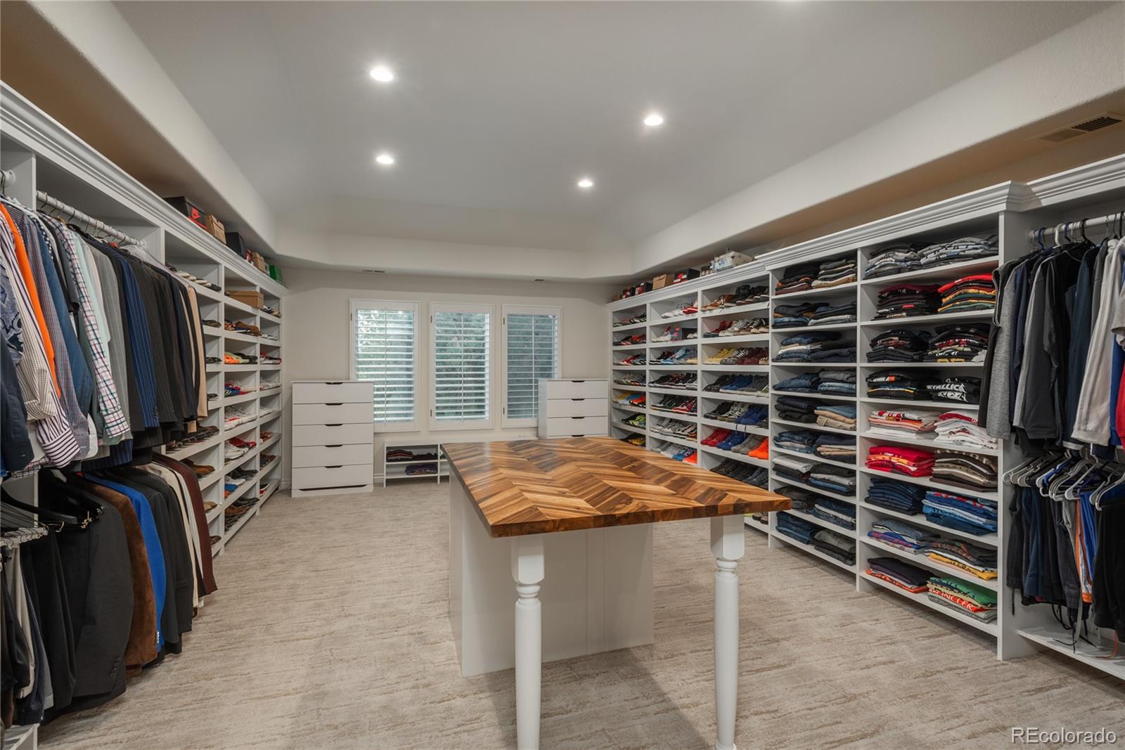 Custom closet in upper level bedroom