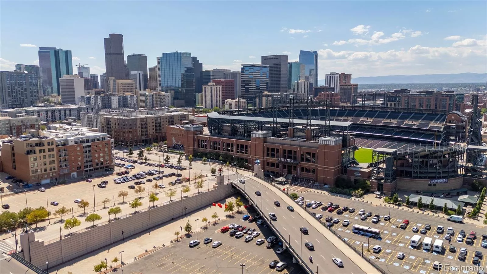 See Coors Field adjacent to your condo!