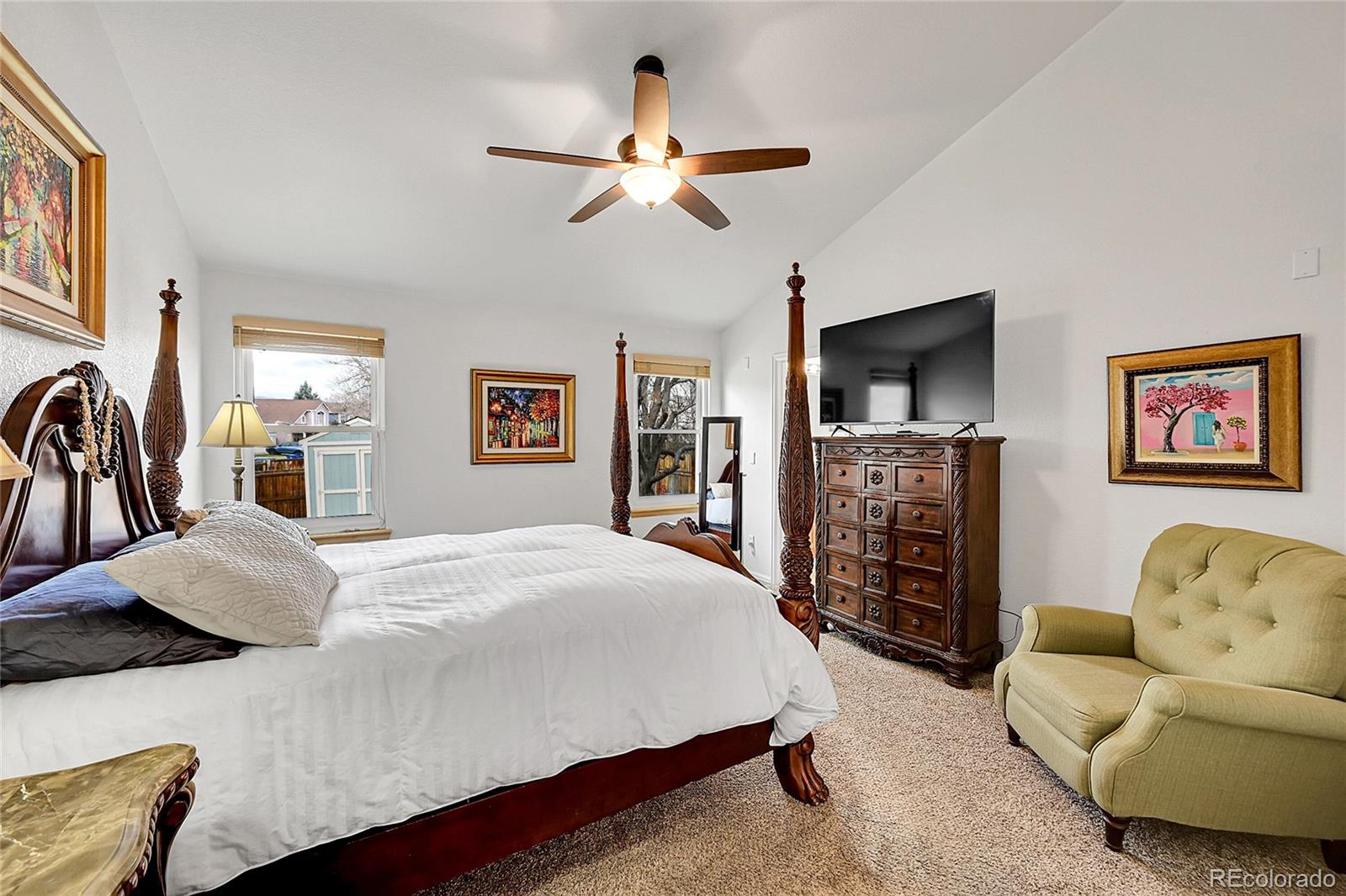 Spacious primary room with vaulted ceilings