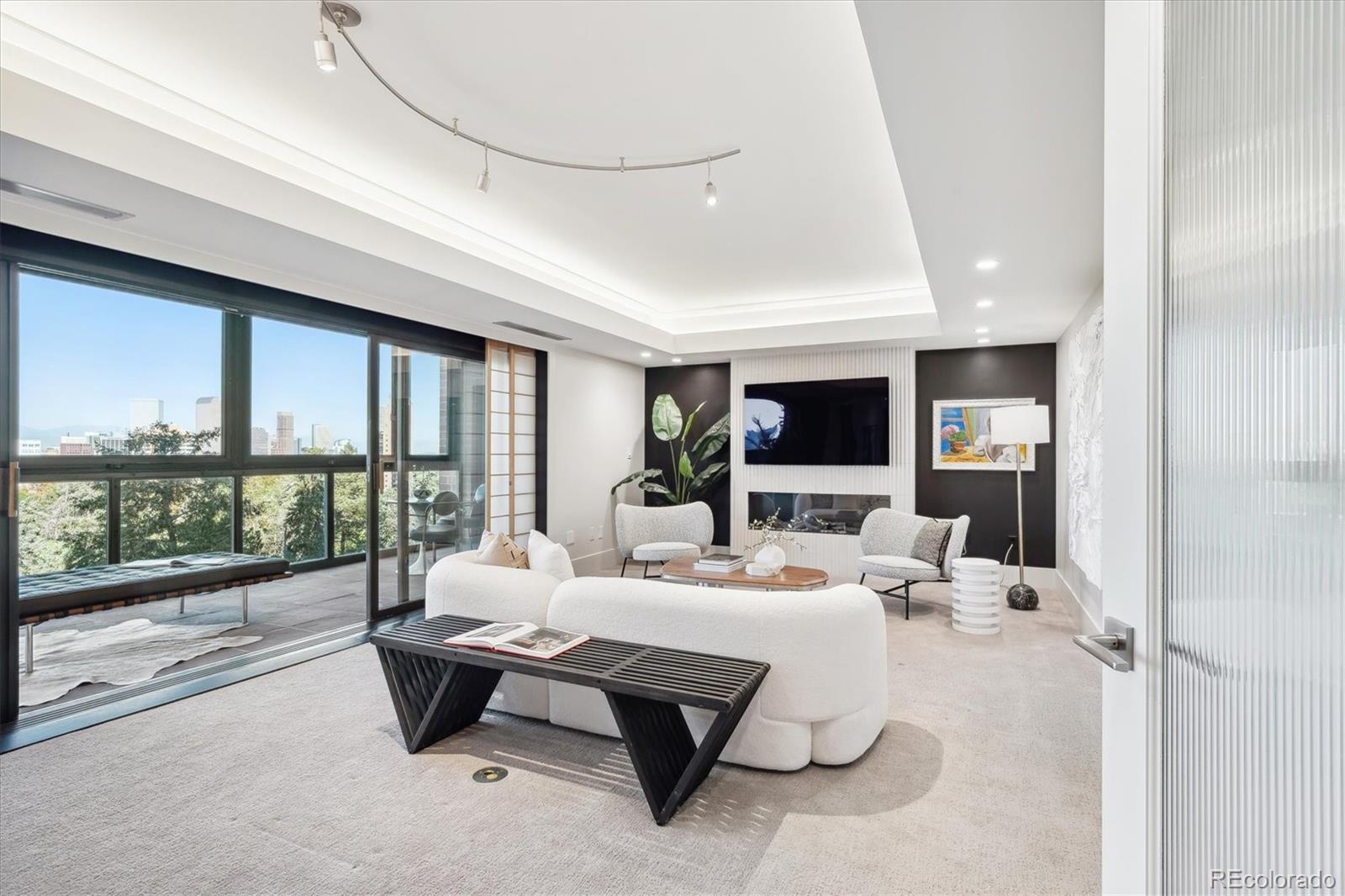 8th-floor family room overlooking sunroom and Cheesman Park