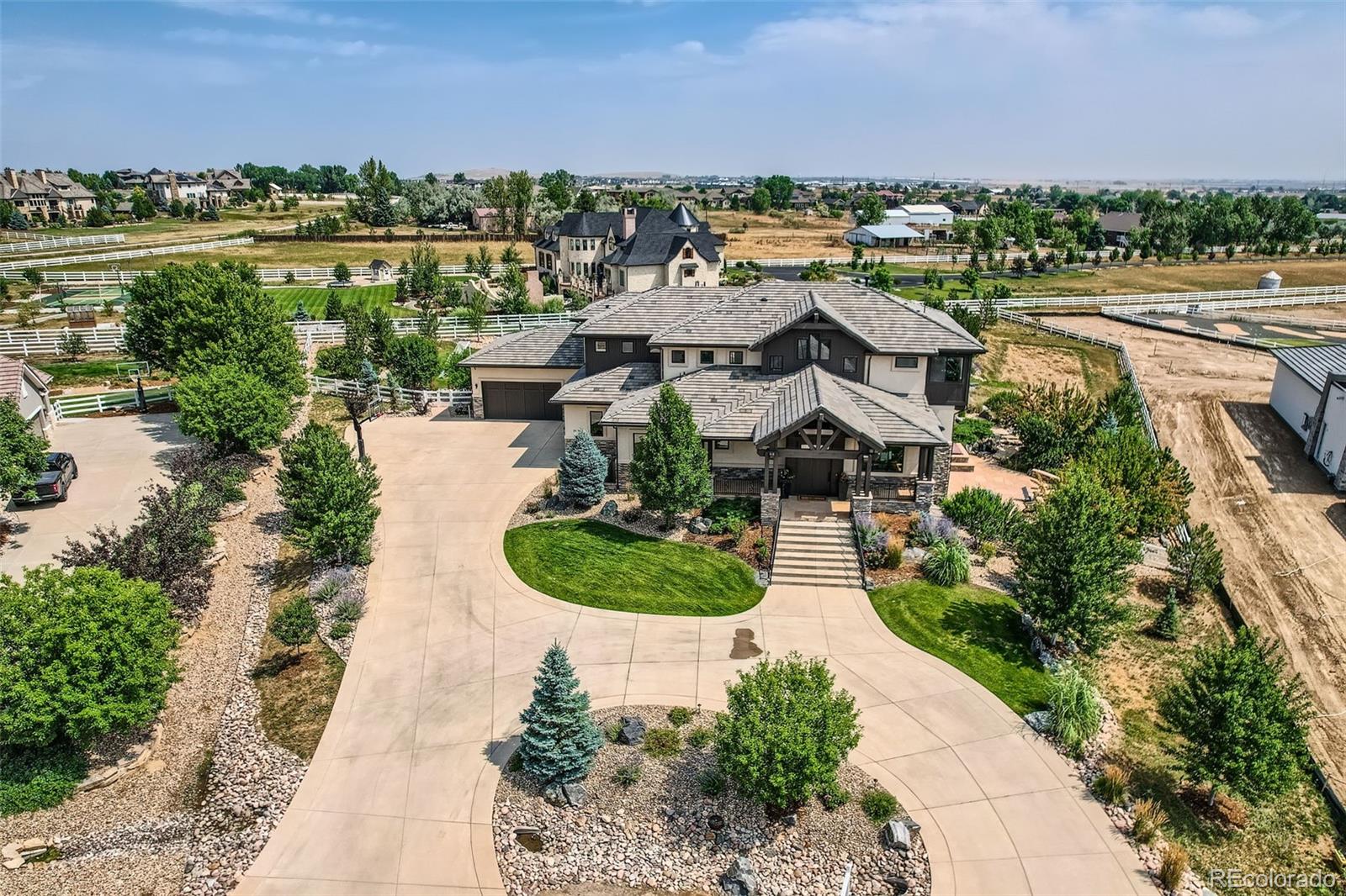 2635 Spruce Meadows Dr, Wide circular driveway on cul-de-sac brings you to this work of craftsmanship by Flatiron Development &Custom Homes, situated on 1.43 acres.