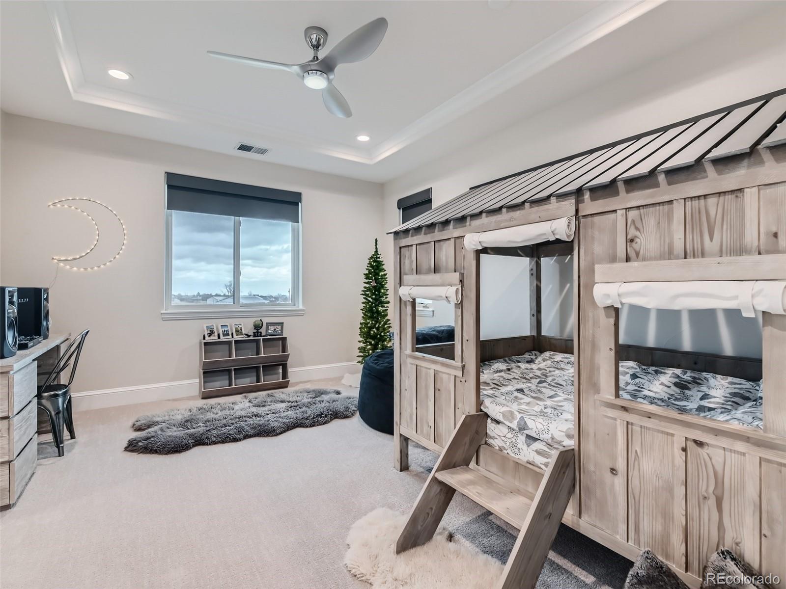 Convenient second laundry room on upper level with built-ins