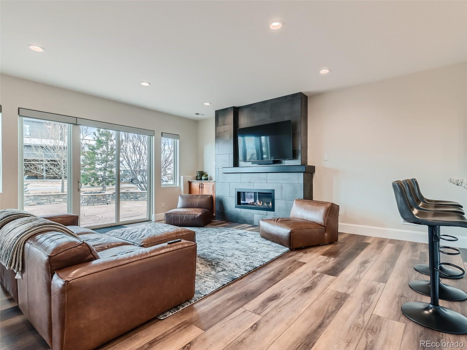 Private guest bedroom on lower level with adjacent spa bathroom.