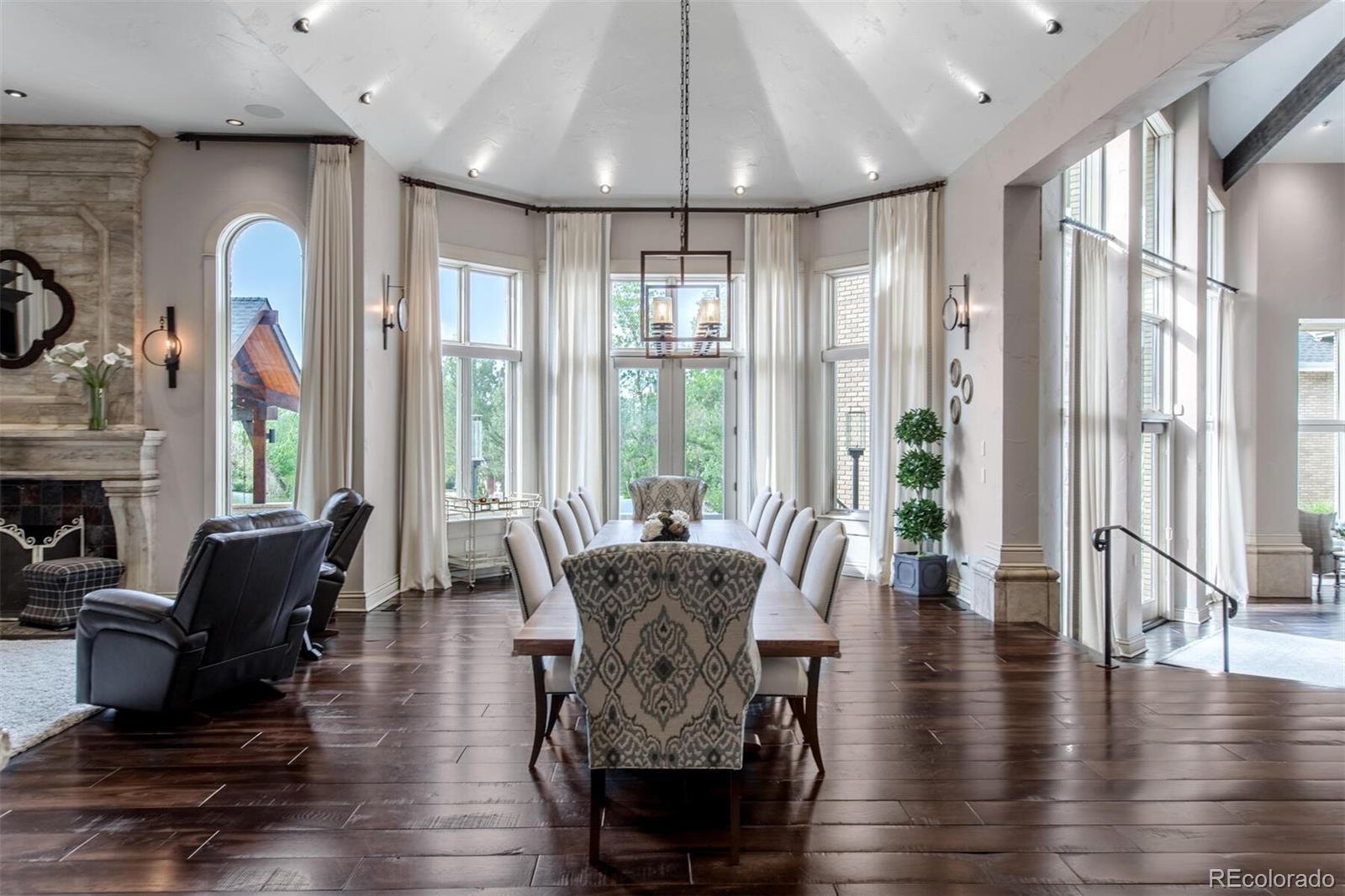 For more elevated affairs, head to the formal dining room with seating for 12. Here you can take the walk-out double doors to a secluded outdoor retreat. An impressive inverted ceiling with theatre lighting and stunning views, your guests will definitely w