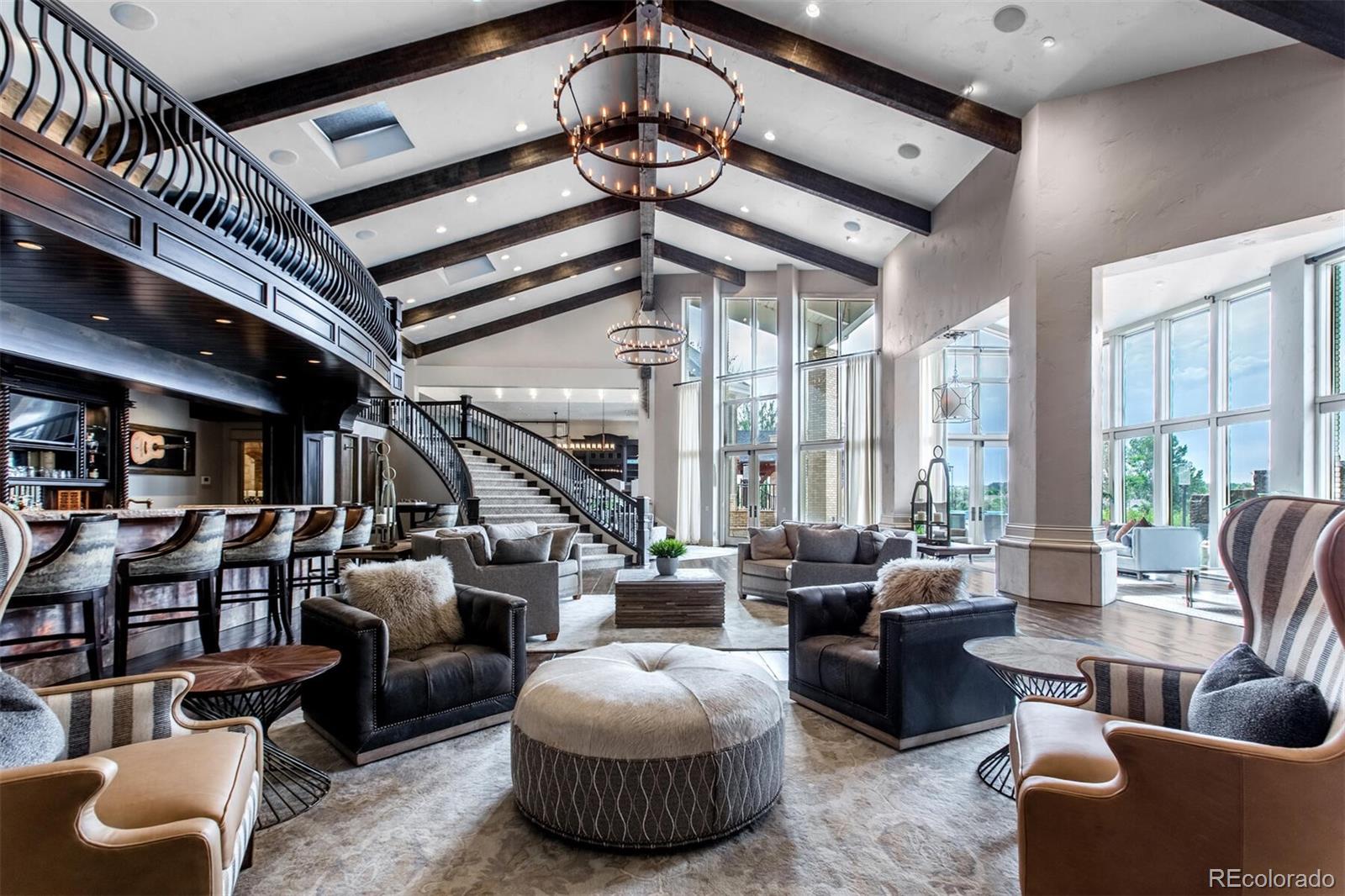 The sweeping staircase leads to the fabulous Media Lounge and Library Overlook, this space is everything.