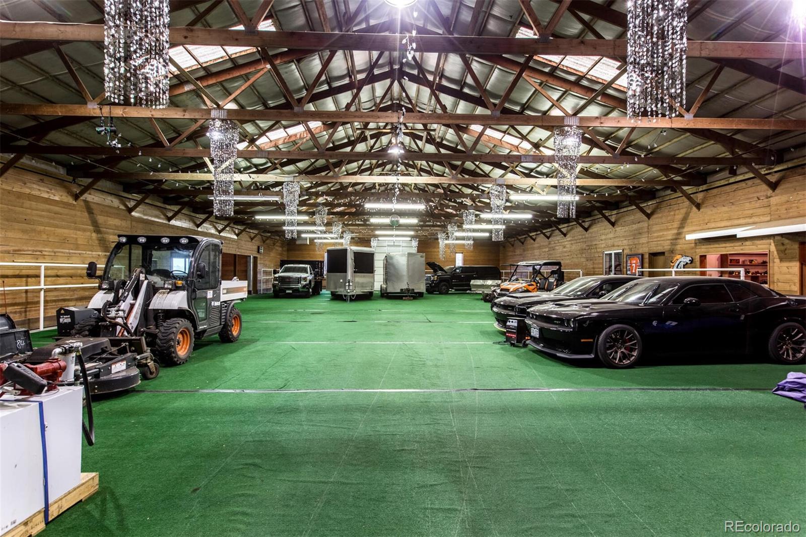 Only a small part of the 20,000 square foot barn located on property. This space can house cars, boats, RV's, tractors, trailers, any kind of "toy" your heart might desire and then some.