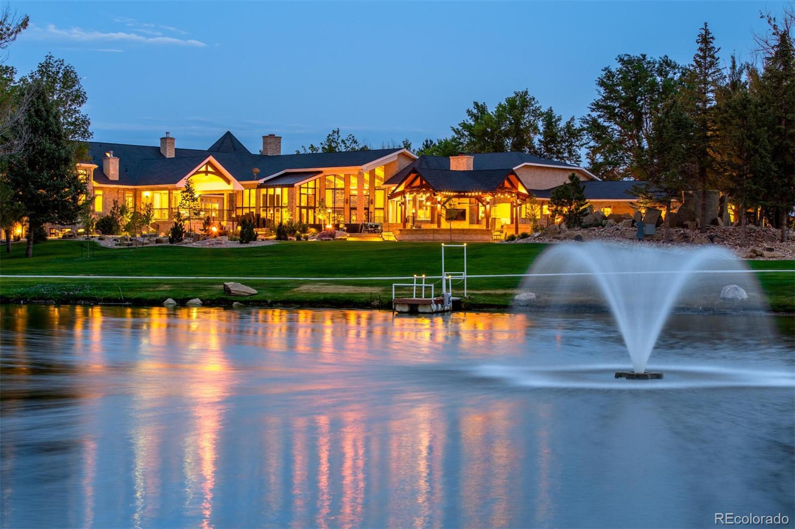 An evening view of one of Colorado's most luxurious and impressive estates, Swan Lake in Evans, Colorado.