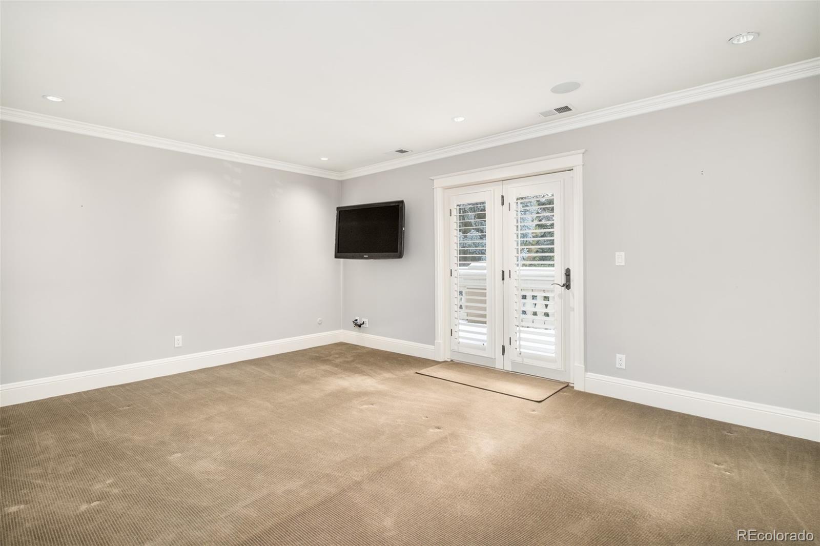 Upstairs Bedroom with access to private balcony