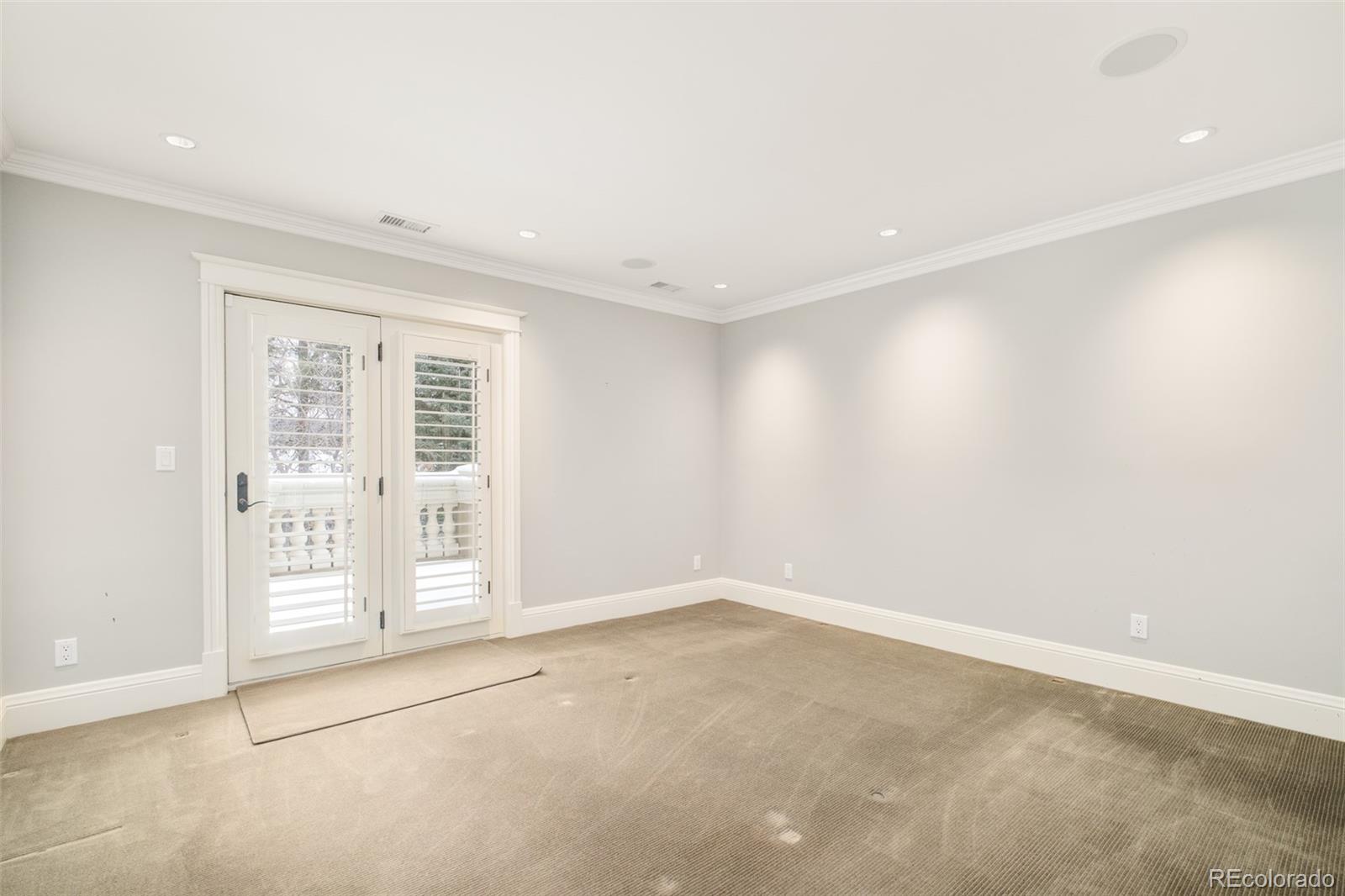 Upstairs Bedroom with access to private balcony