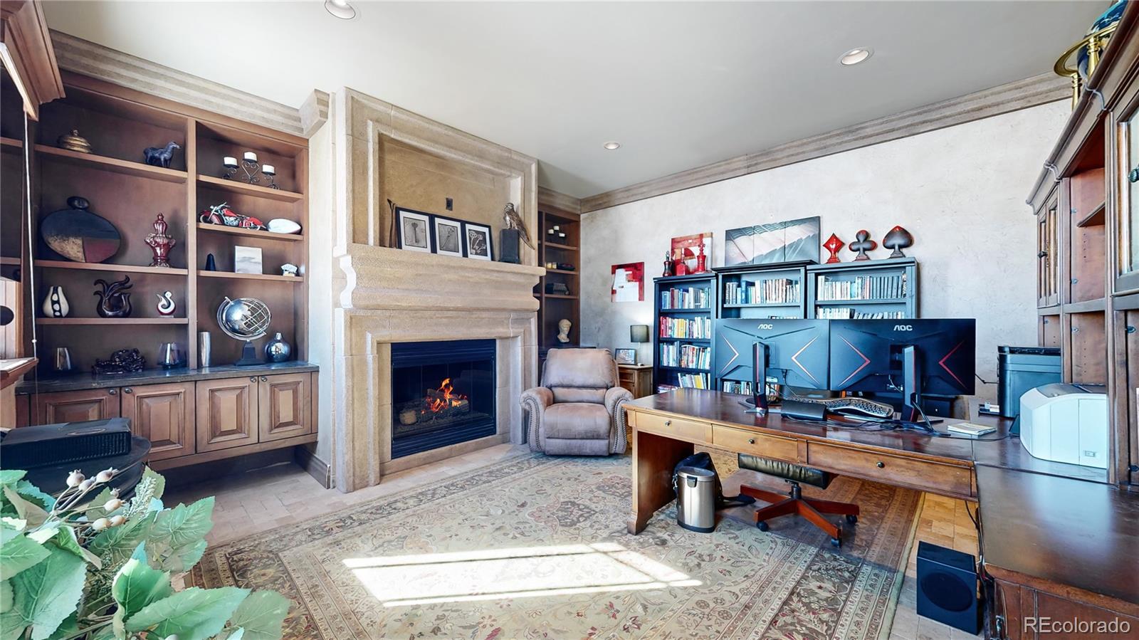 Main Floor Office with Built-Ins and Gas Fireplace