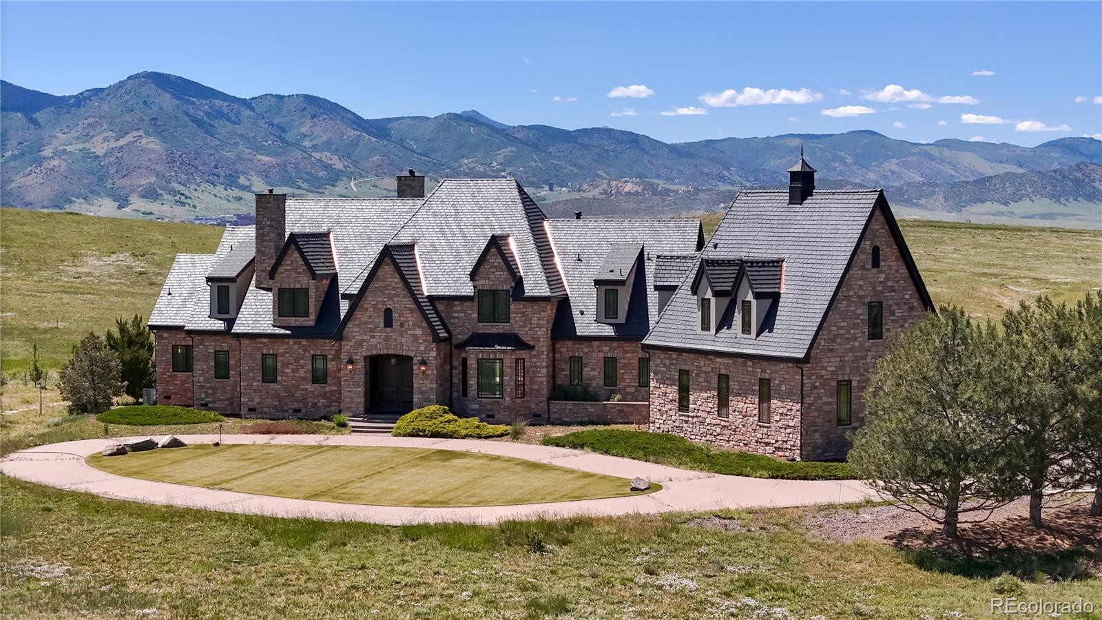 Imagine yourself in this gorgeous estate property on 35 acres only 30 minutes southwest of Downtown Denver!