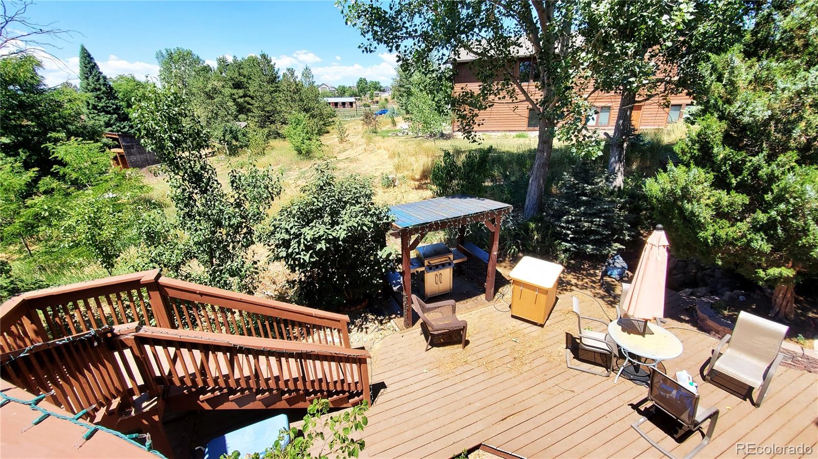 Party Central w/ Covered BBQ Area for cooking up good times!