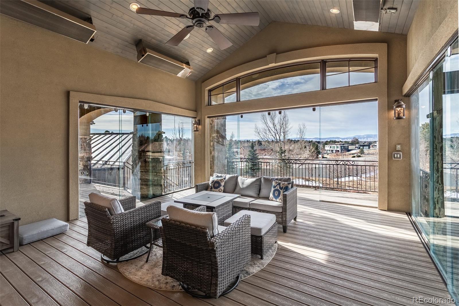 Full inclosed outdoor sunroom with mountain views. Glass doors can be opened.