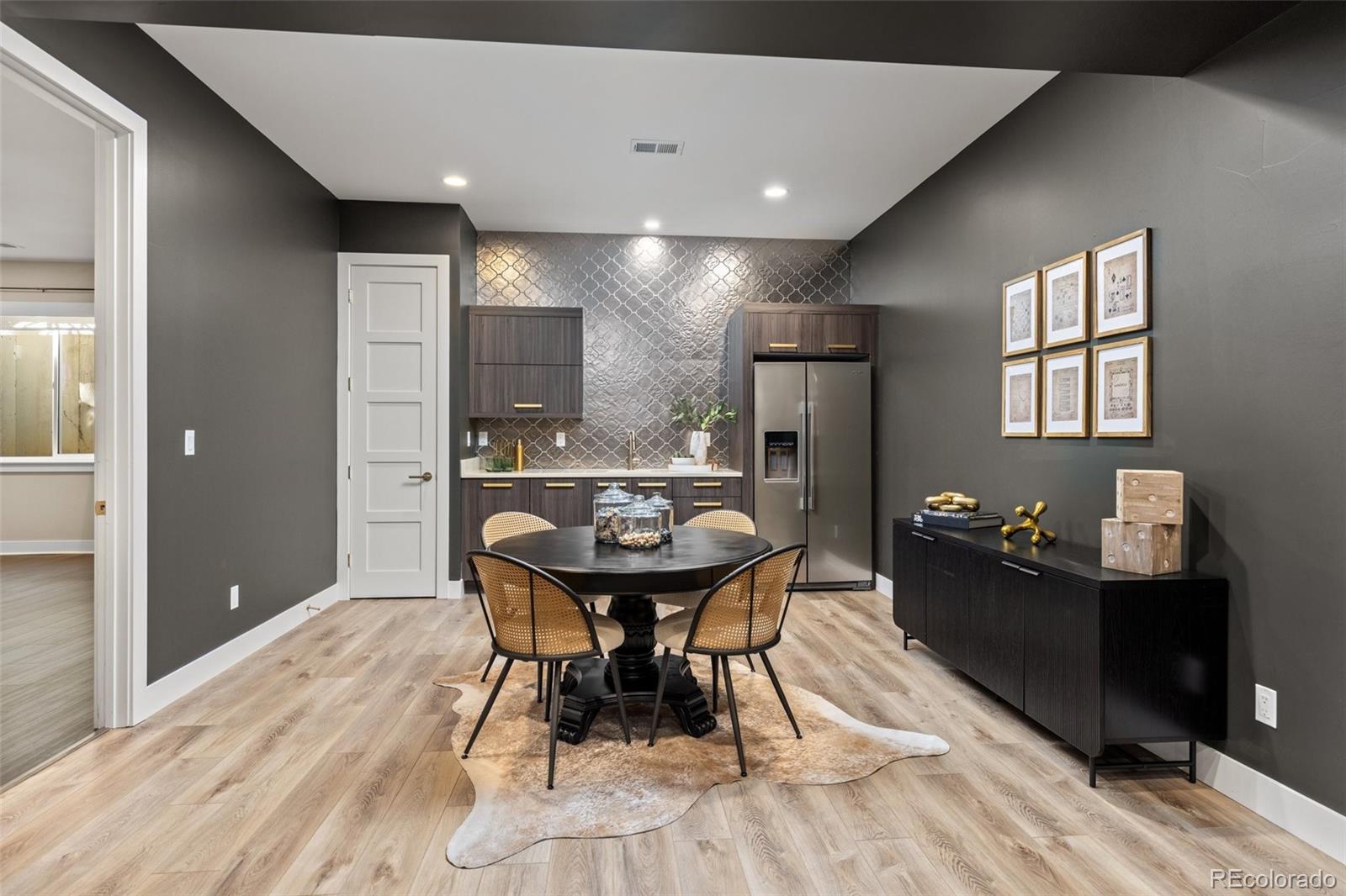 Elegant and Sleek basement kitchenette and entertainment room