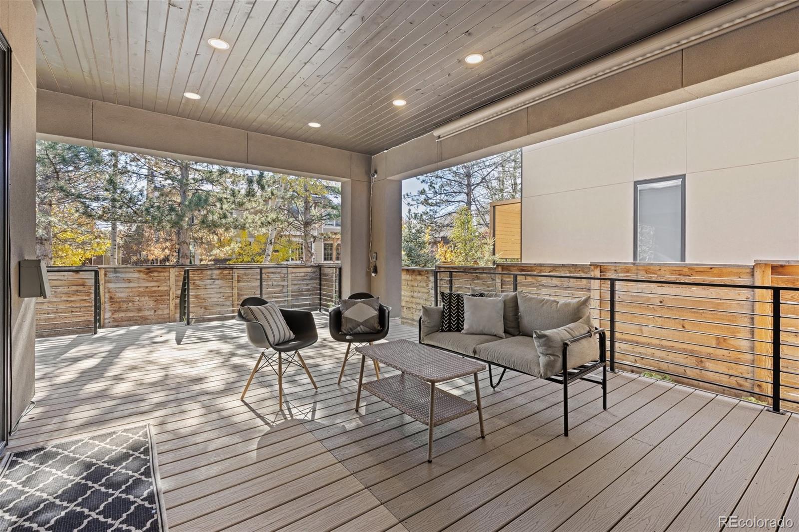 Outdoor patio with retractable Movie screen and Heaters.