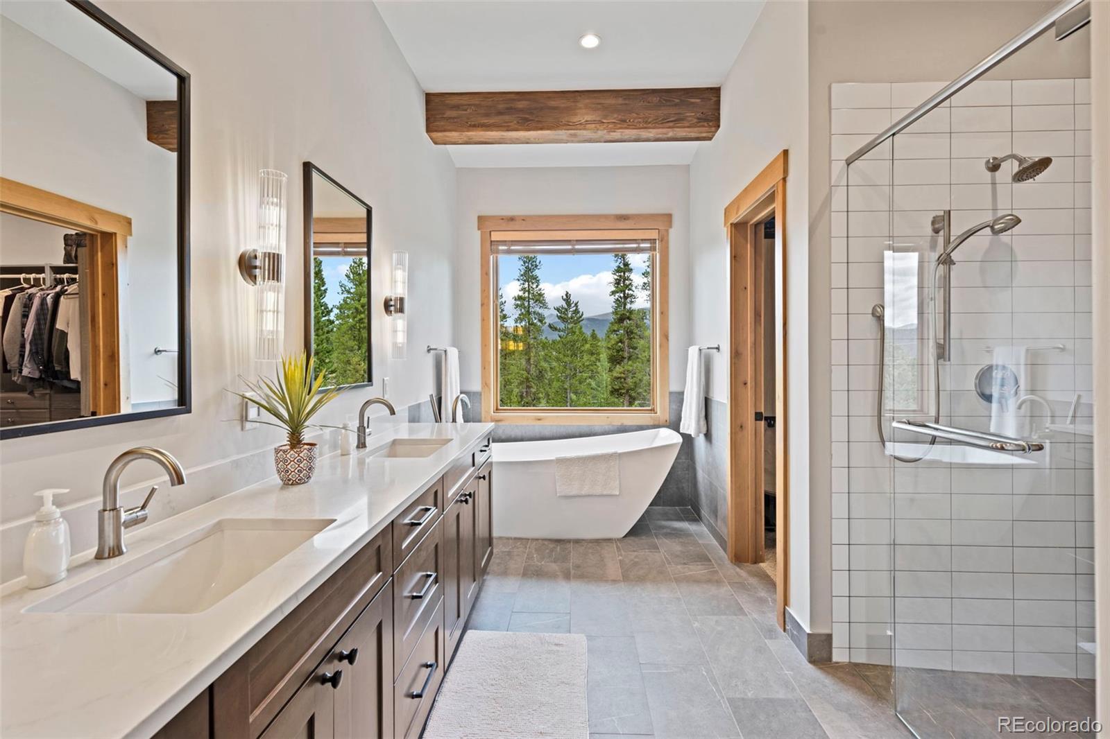 Spa-like primary bathroom with a luxury soak tub