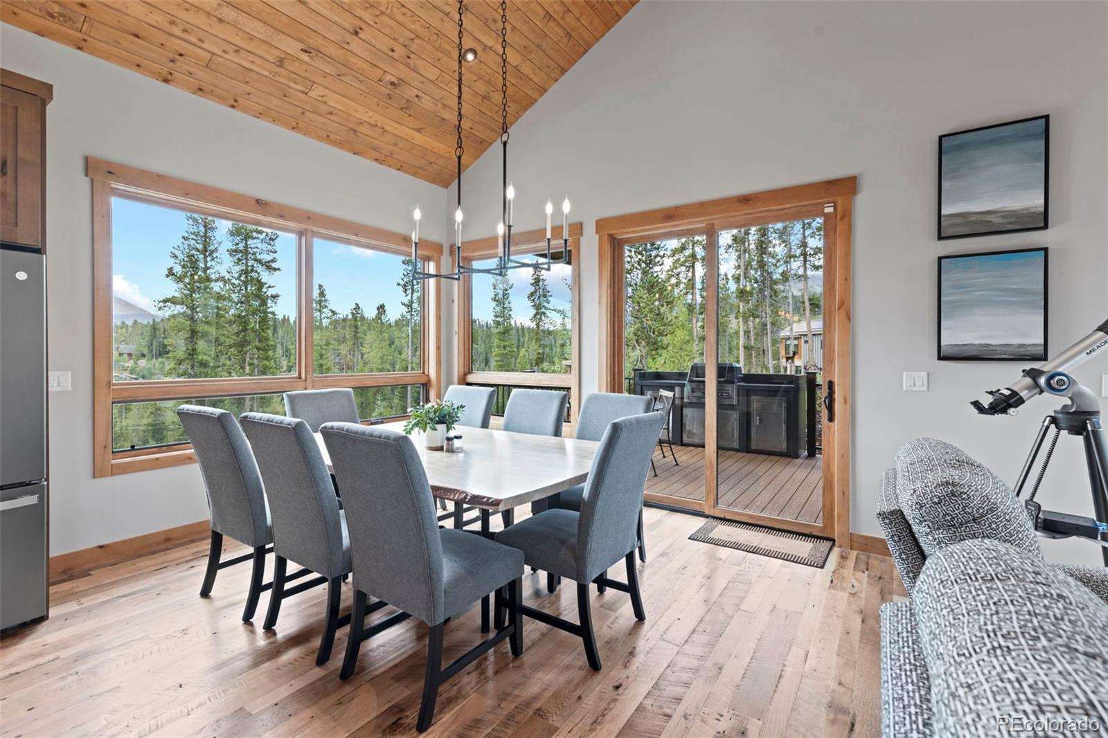 Oversized dining room with a custom live edge table that will seat 10.