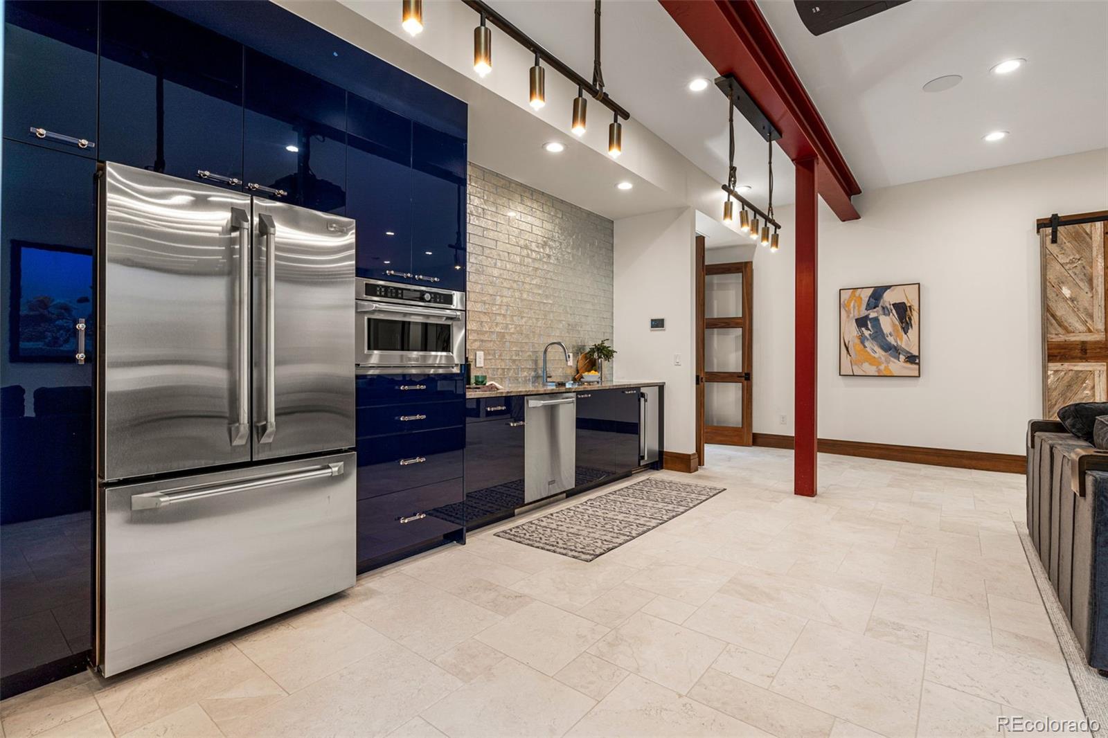 wet bar with a full-sized refrigerator, dishwasher, oven/microwave, and ice machine