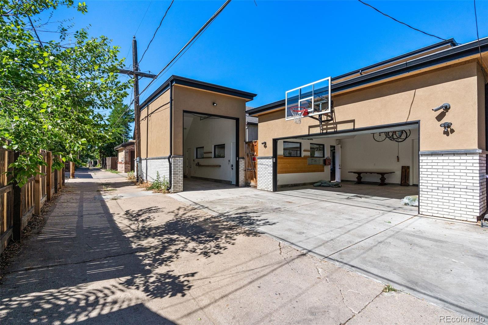 Detached 2 car garage w/ additional detached garage that has a 12' garage door