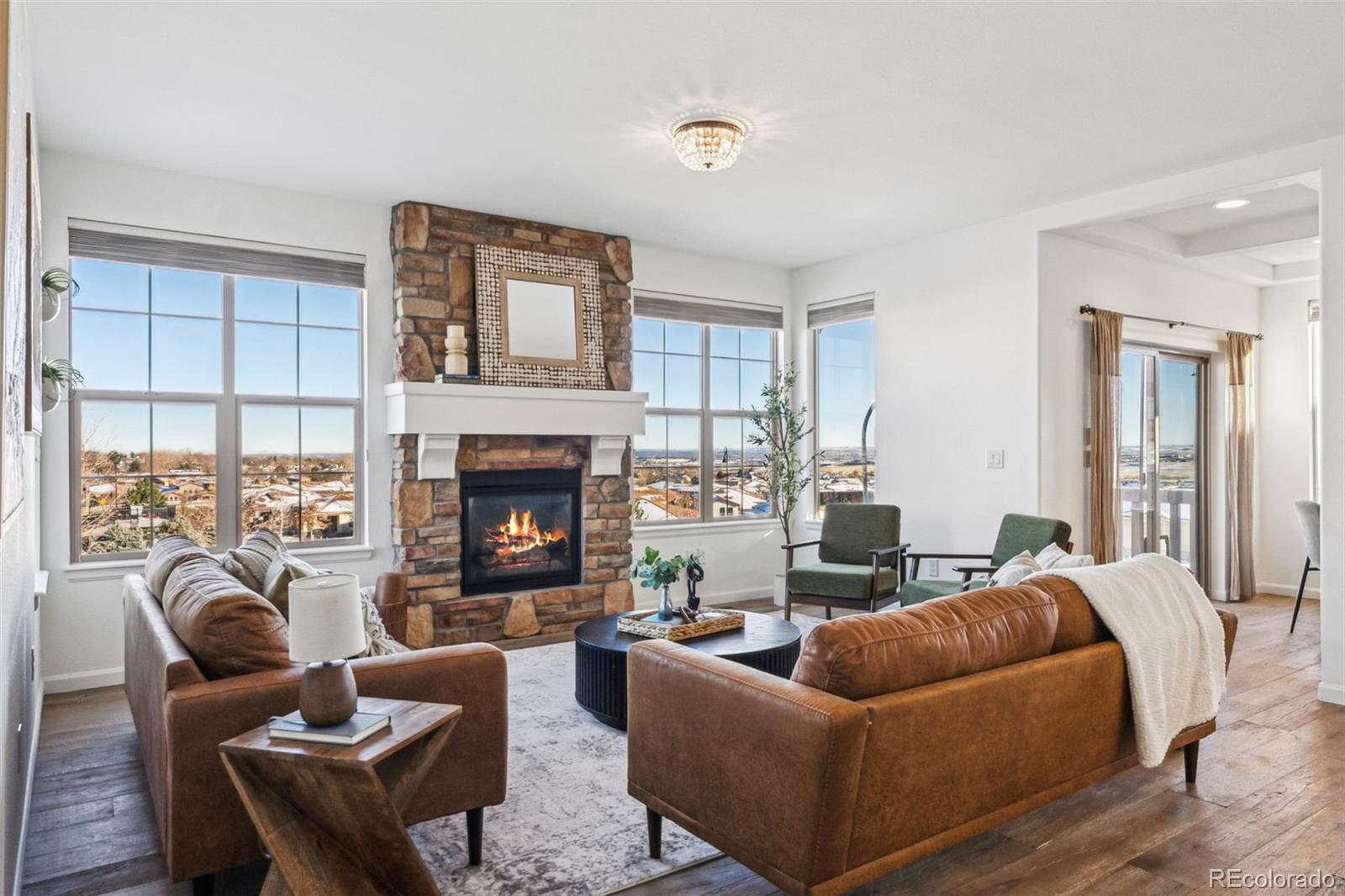 Living room with gas fireplace and views!